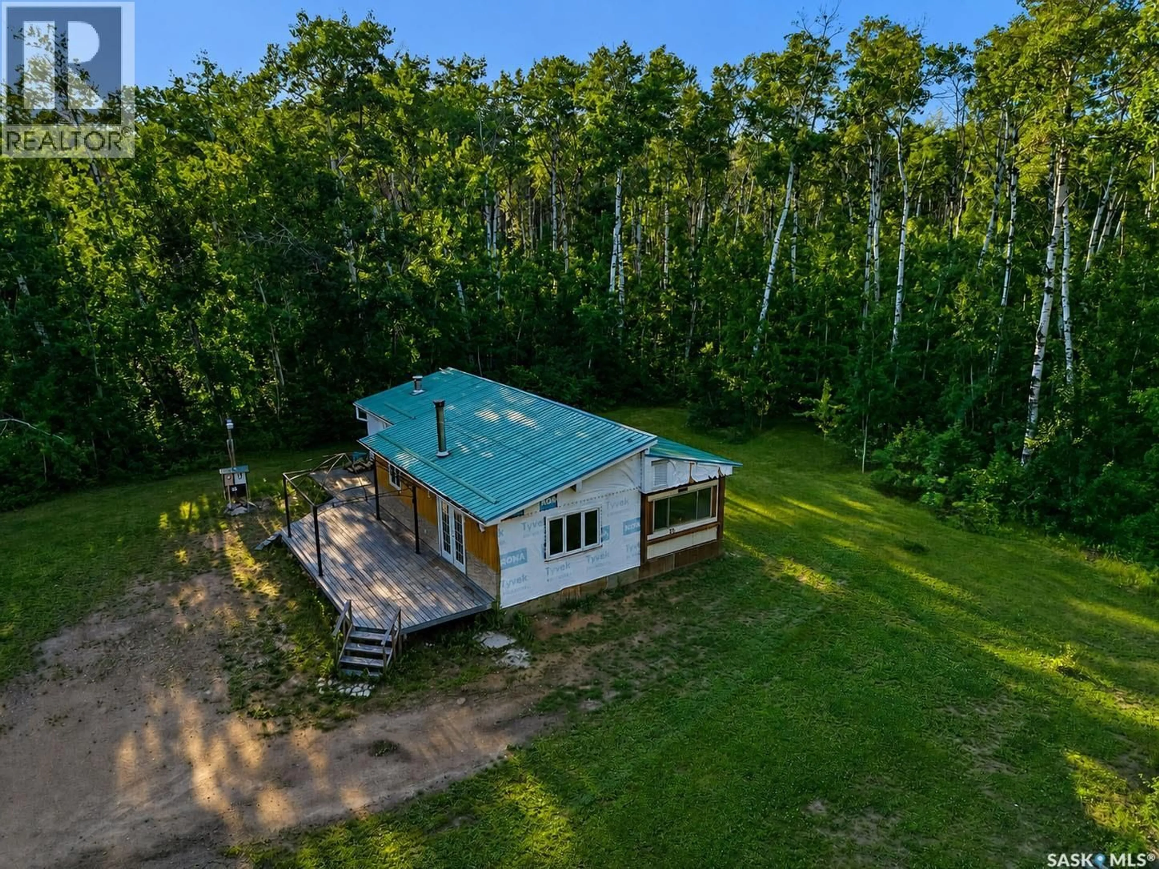 A pic from outside/outdoor area/front of a property/back of a property/a pic from drone, forest/trees view for 207 BROWN STREET, Paddockwood Rm No. 520 Saskatchewan S0J0N0
