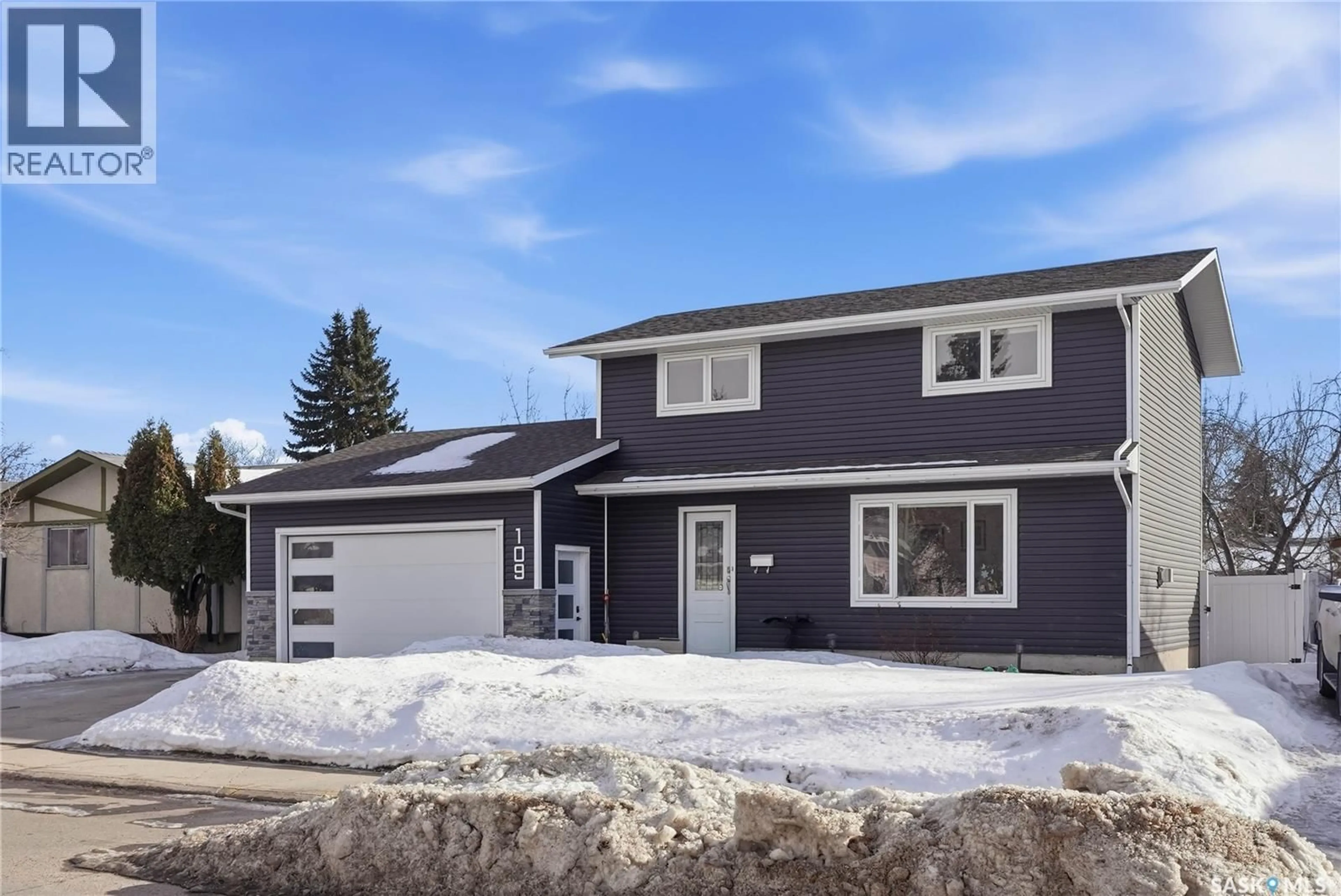 Home with vinyl exterior material, street for 109 CHURCHILL DRIVE, Saskatoon Saskatchewan S7K3X3