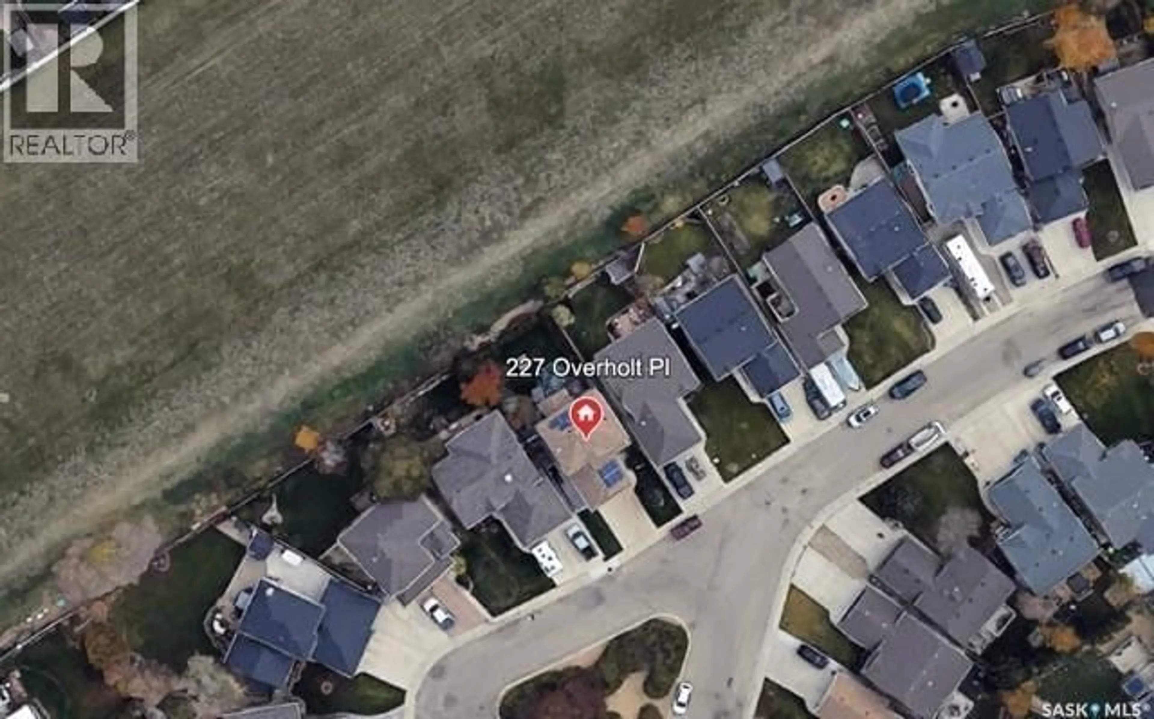 A pic from outside/outdoor area/front of a property/back of a property/a pic from drone, street for 227 OVERHOLT PLACE, Saskatoon Saskatchewan S7N4S9
