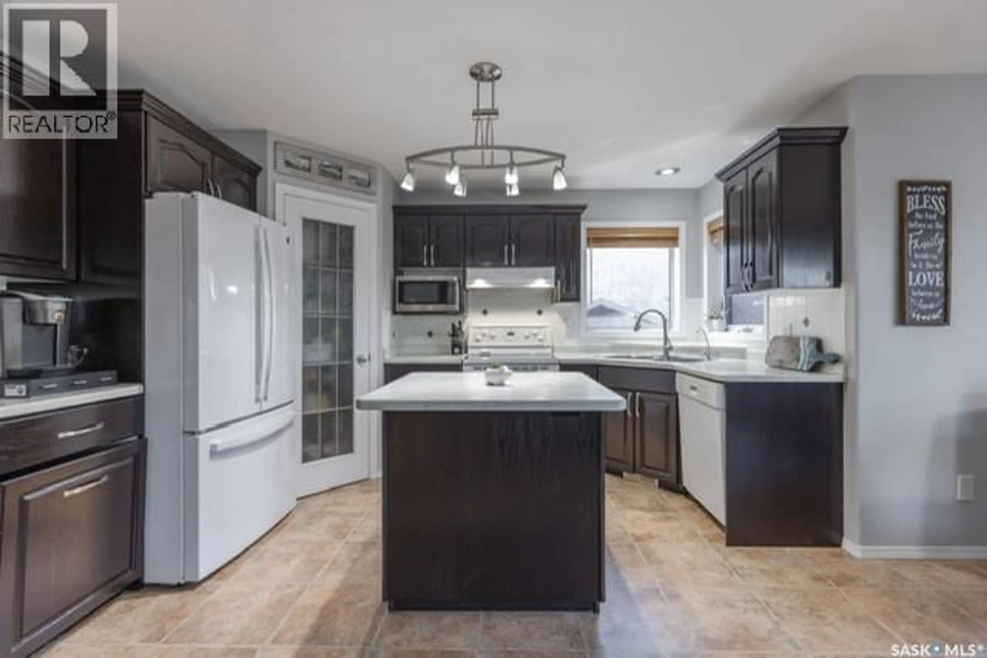 Contemporary kitchen, ceramic/tile floor for 227 OVERHOLT PLACE, Saskatoon Saskatchewan S7N4S9