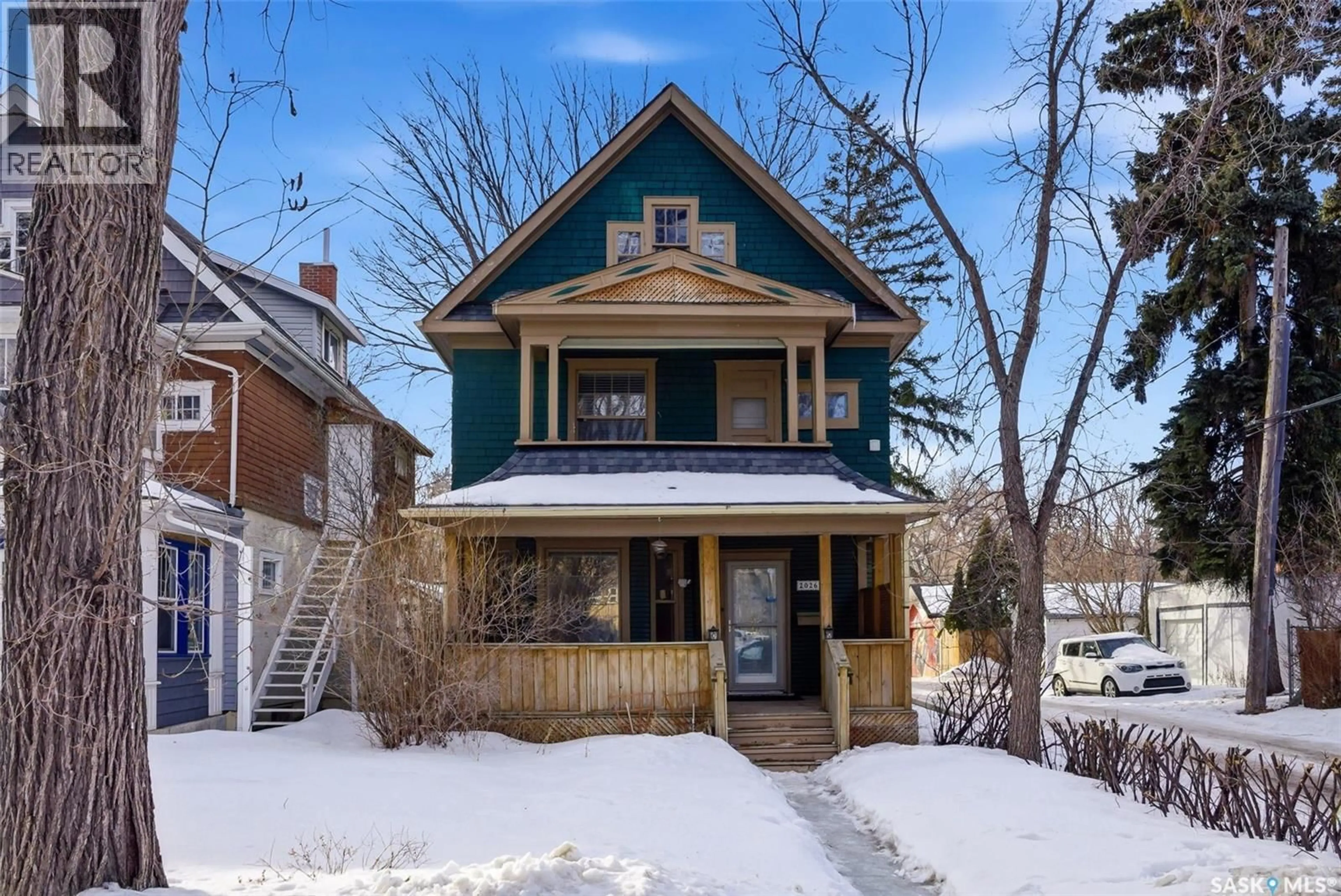 Home with brick exterior material, street for 2026 GARNET STREET, Regina Saskatchewan S4T2Z6