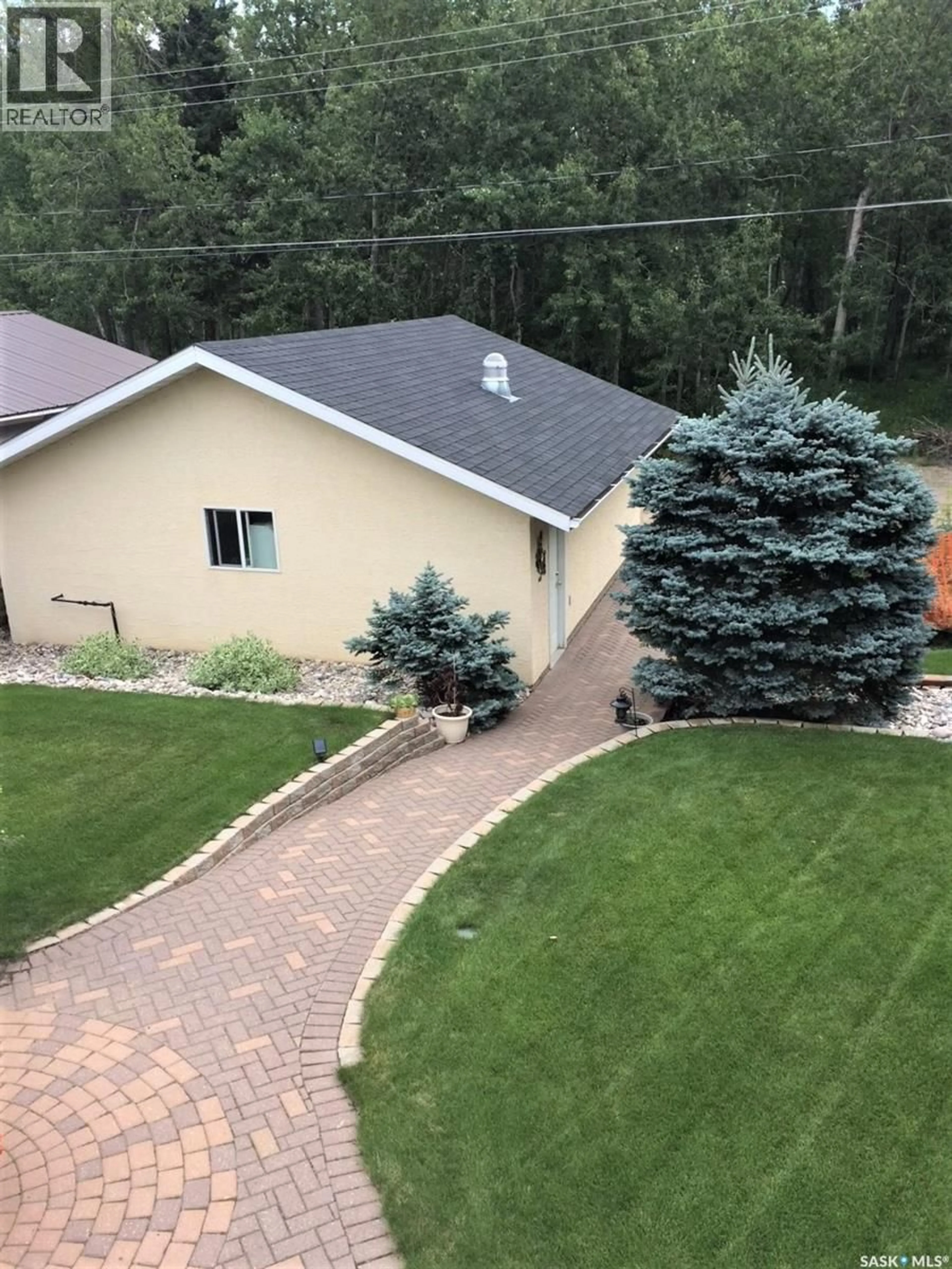 A pic from outside/outdoor area/front of a property/back of a property/a pic from drone, unknown for 718 DONALD STREET, Hudson Bay Saskatchewan S0E0Y0
