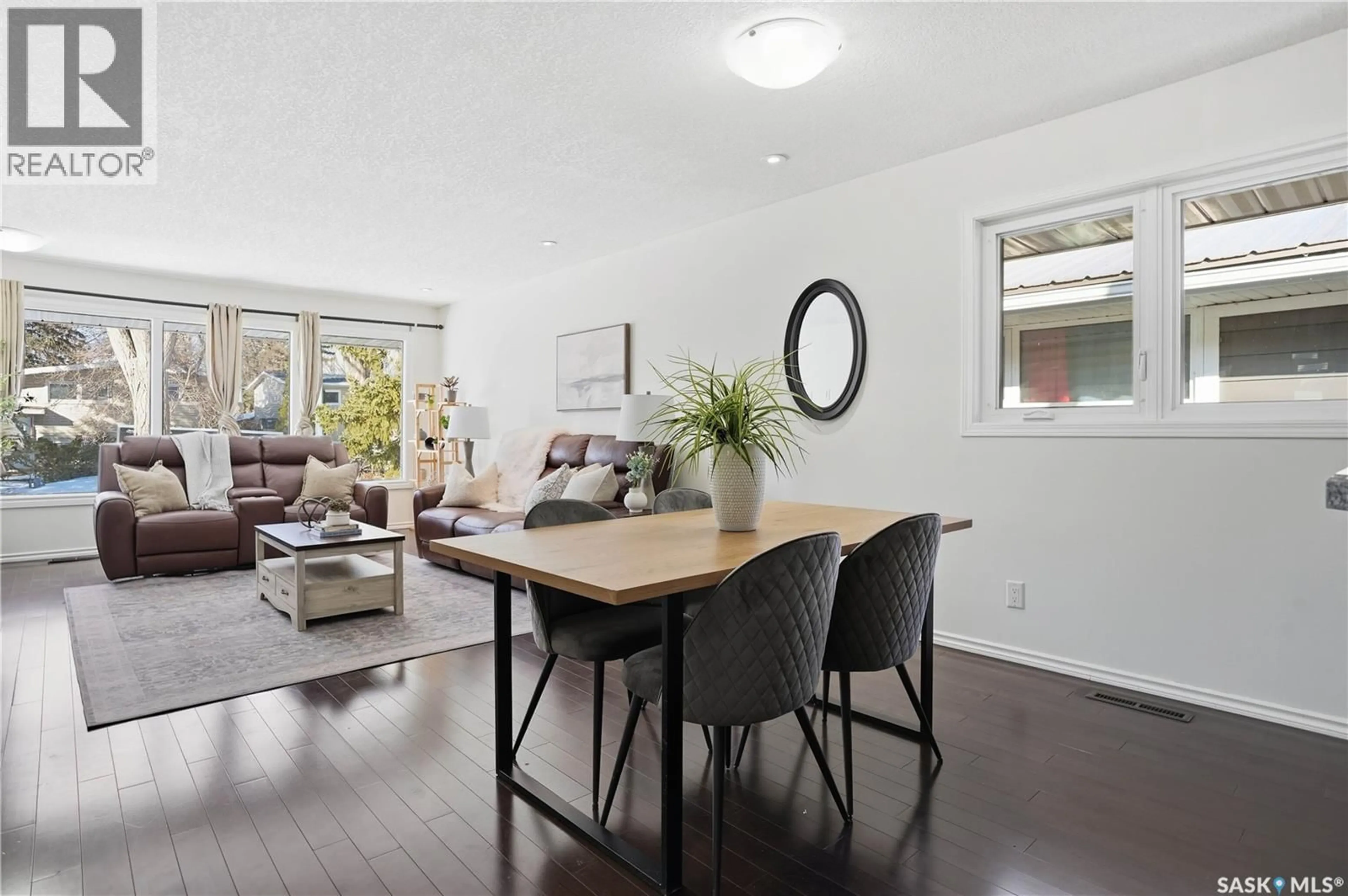 Living room with furniture, wood/laminate floor for 45 GARDINER AVENUE, Regina Saskatchewan S4S4P5