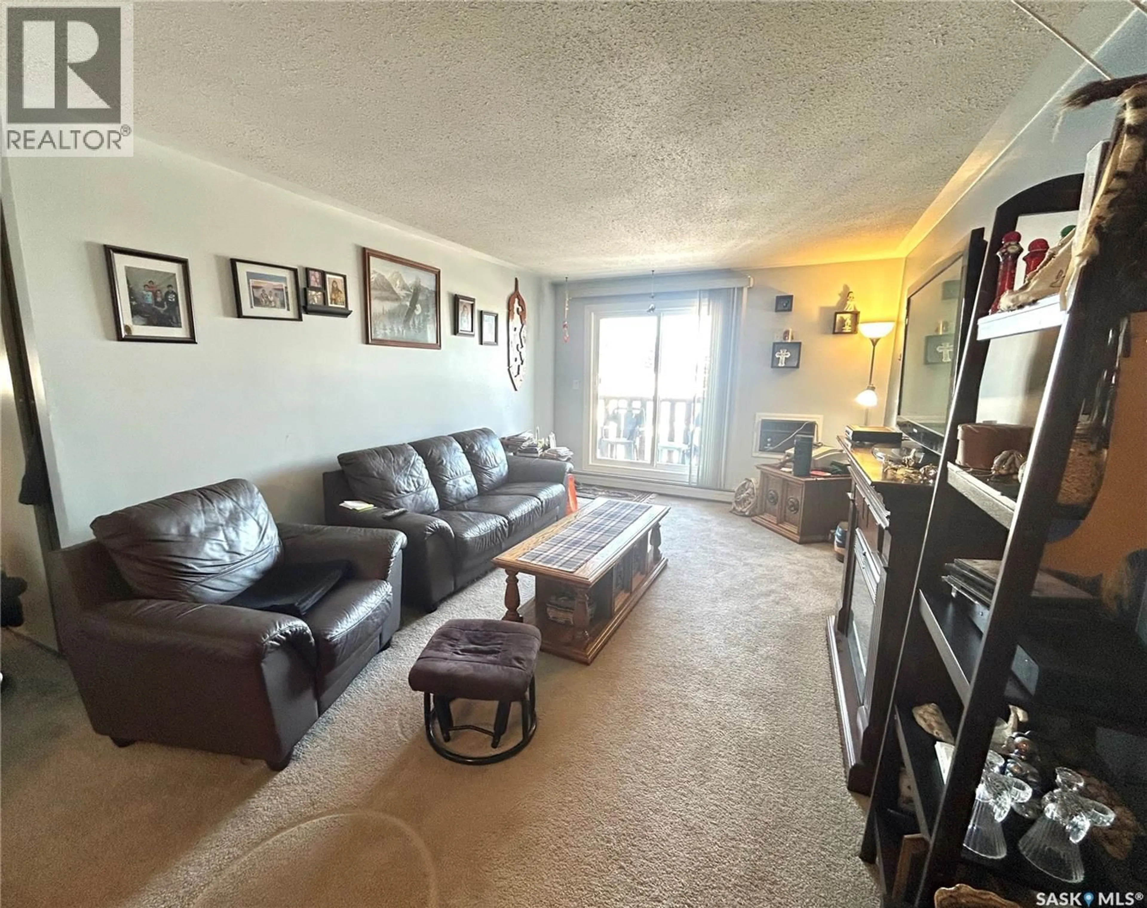 Living room with furniture, unknown for 1580 - 417 OLIVE DIEFENBAKER DRIVE, Prince Albert Saskatchewan S6V7M6