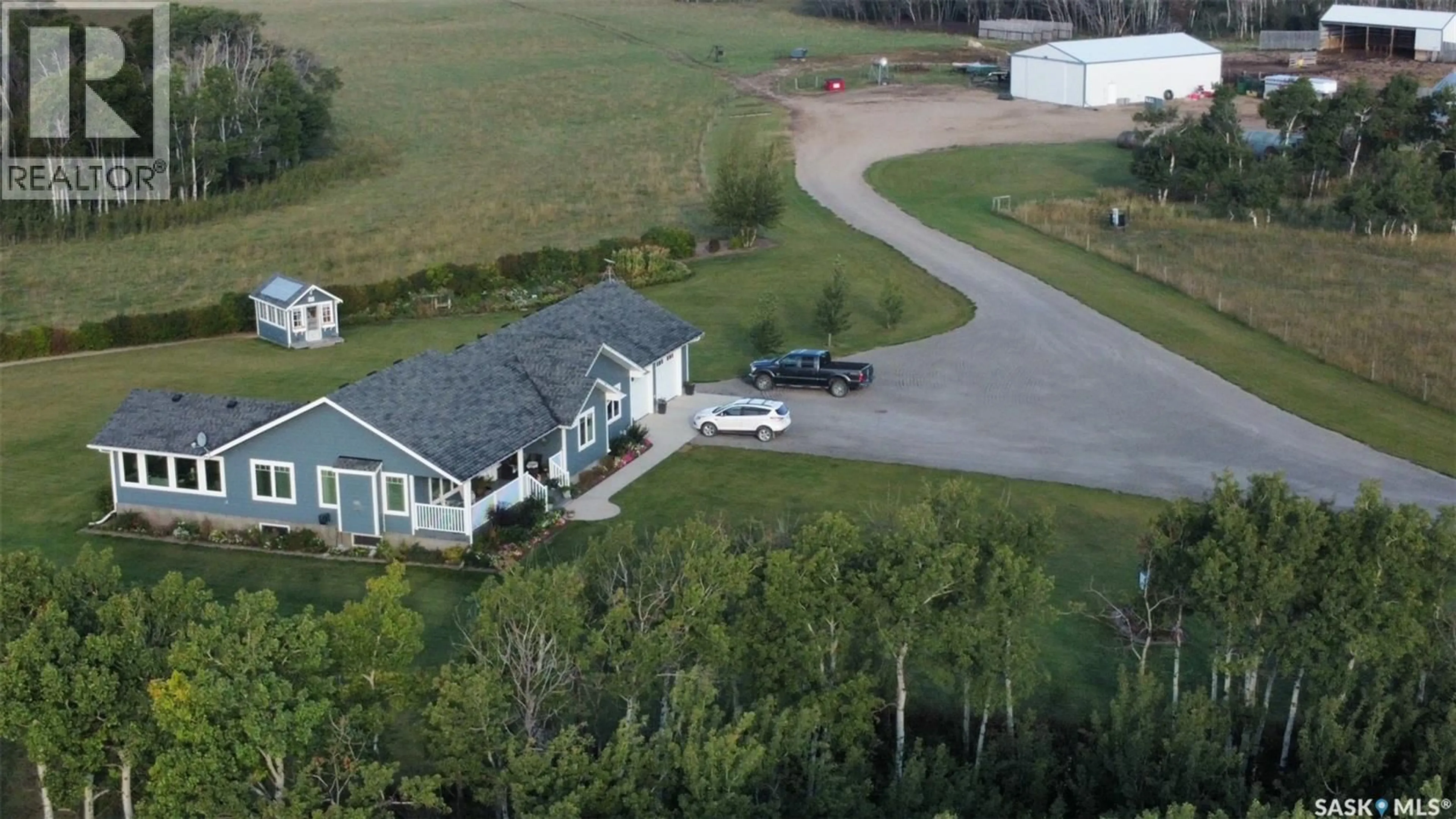 A pic from outside/outdoor area/front of a property/back of a property/a pic from drone, mountain view for 1908 HIGHWAY 364, Edenwold Rm No.158 Saskatchewan S0G0E0