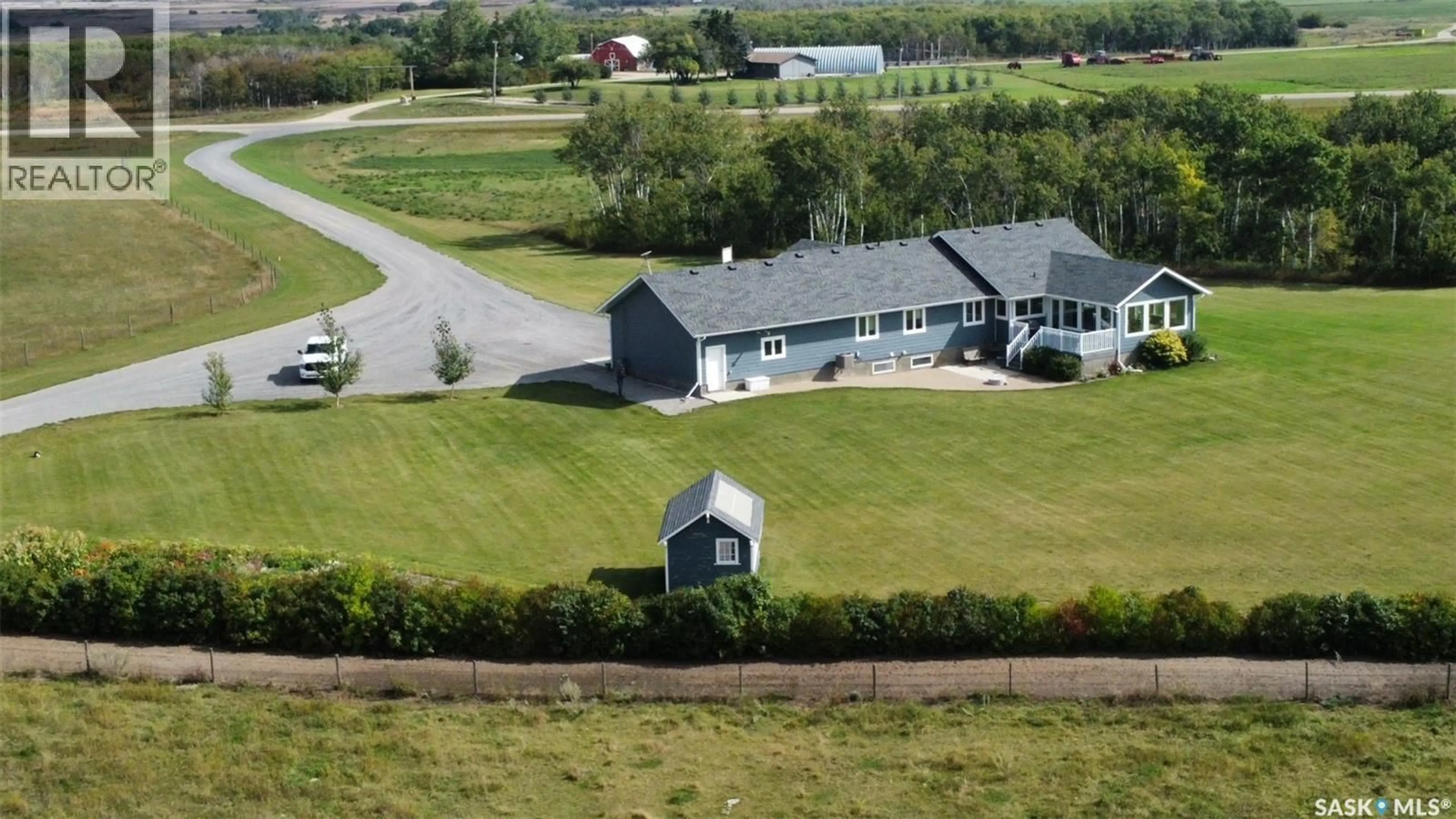 A pic from outside/outdoor area/front of a property/back of a property/a pic from drone, mountain view for 1908 HIGHWAY 364, Edenwold Rm No.158 Saskatchewan S0G0E0