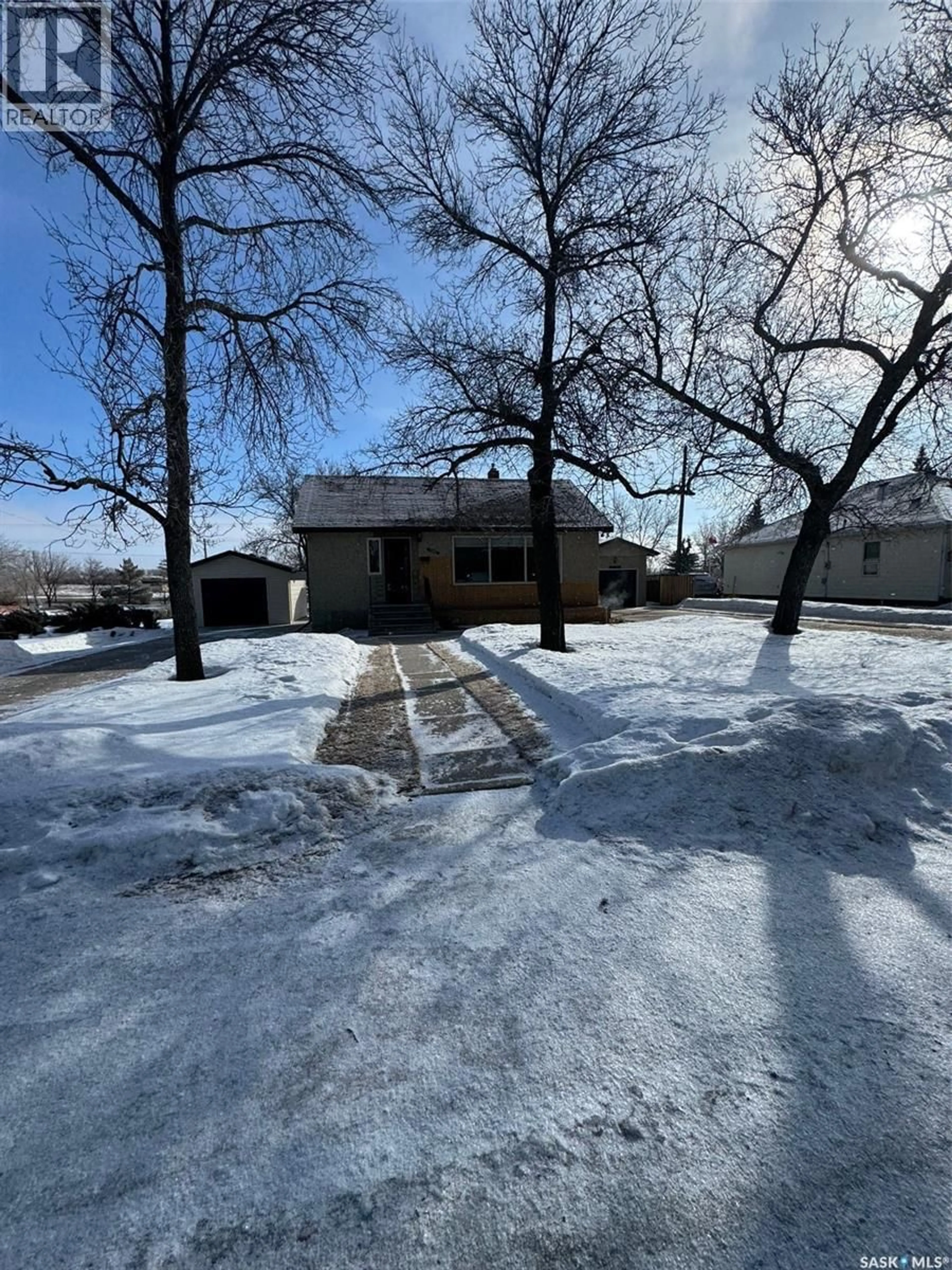 A pic from outside/outdoor area/front of a property/back of a property/a pic from drone, street for 1082 113TH STREET, North Battleford Saskatchewan S9A2M1