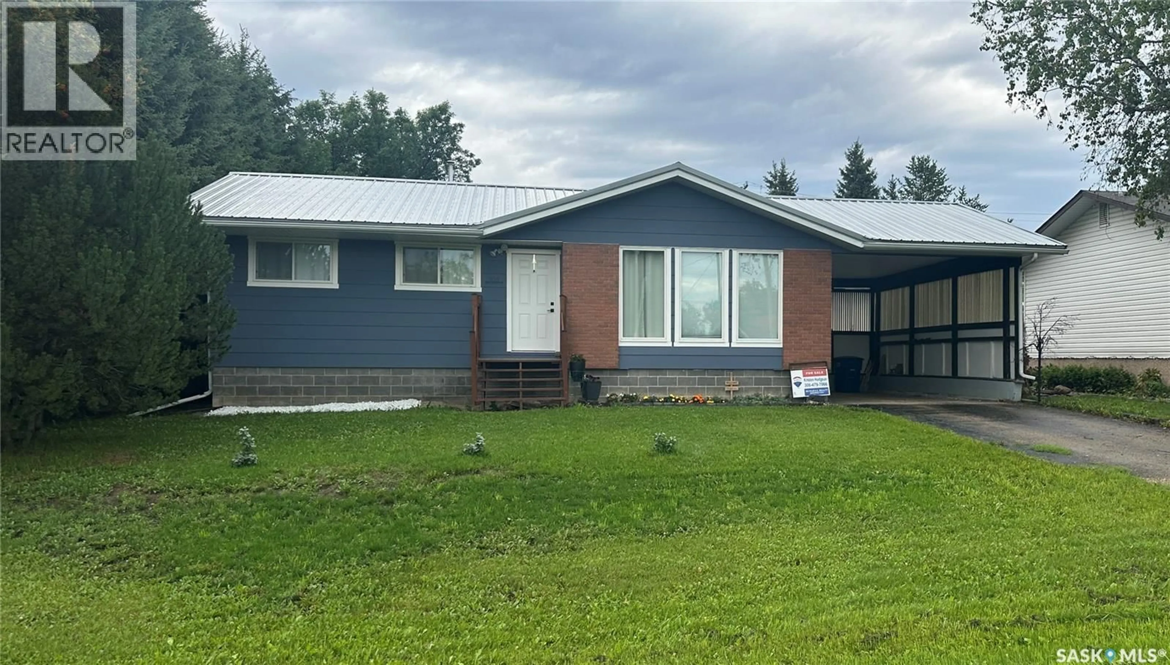 Home with vinyl exterior material, street for 105 6TH AVENUE, Big River Saskatchewan S0J0E0