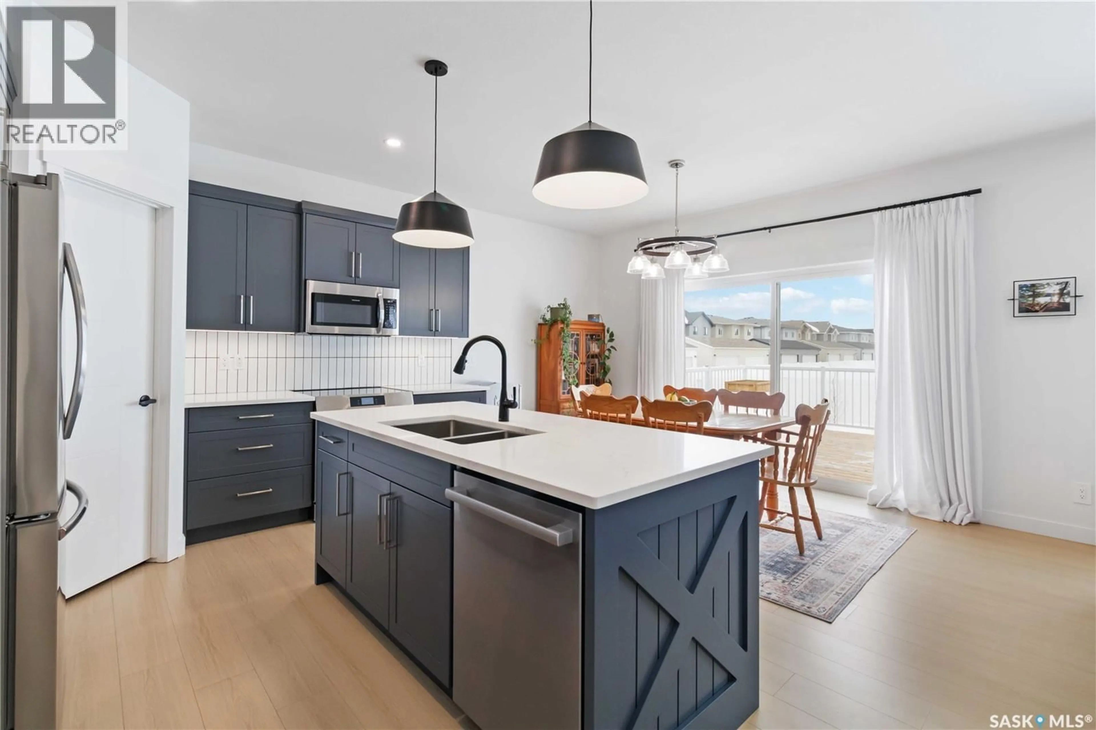 Open concept kitchen, ceramic/tile floor for 126 CHELSOM BEND, Saskatoon Saskatchewan S7V1L1