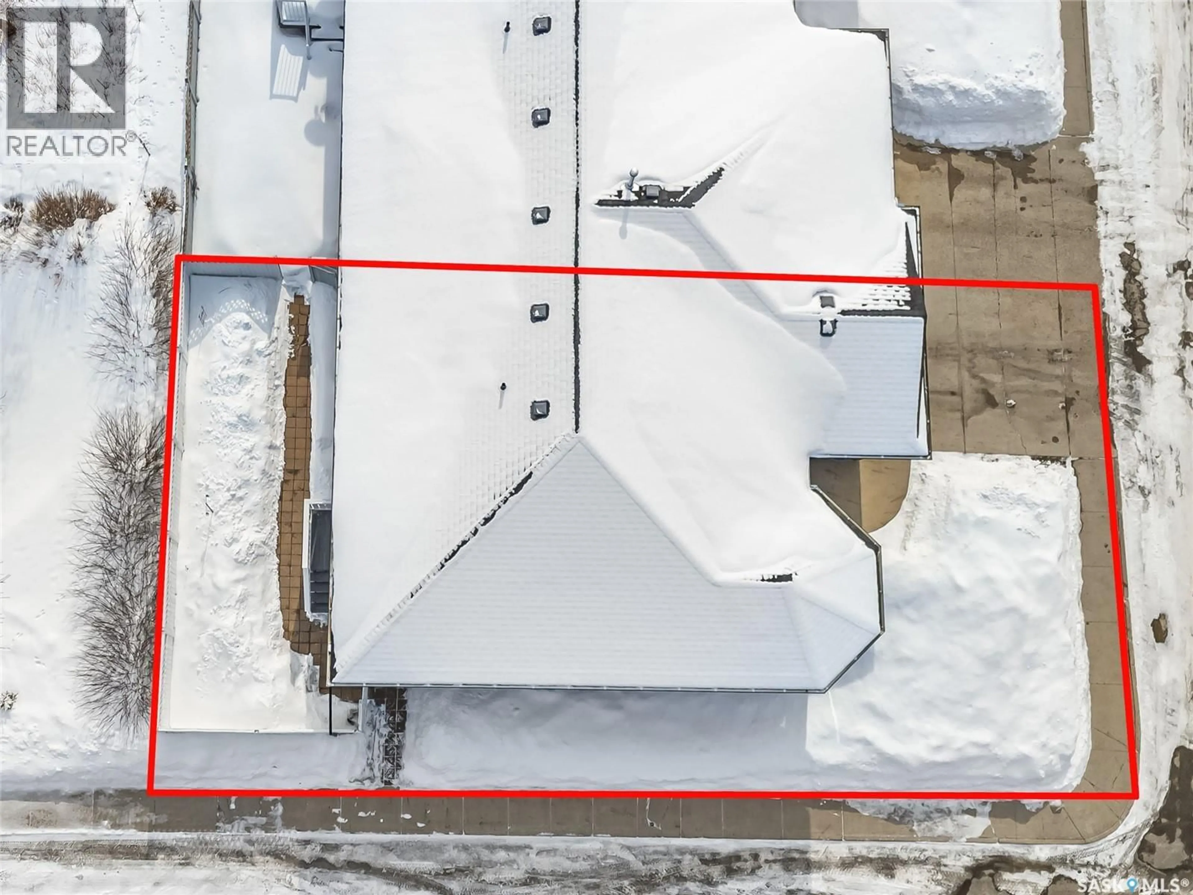 A pic from outside/outdoor area/front of a property/back of a property/a pic from drone, building for 801 1ST AVENUE, Rosthern Saskatchewan S0K4P0