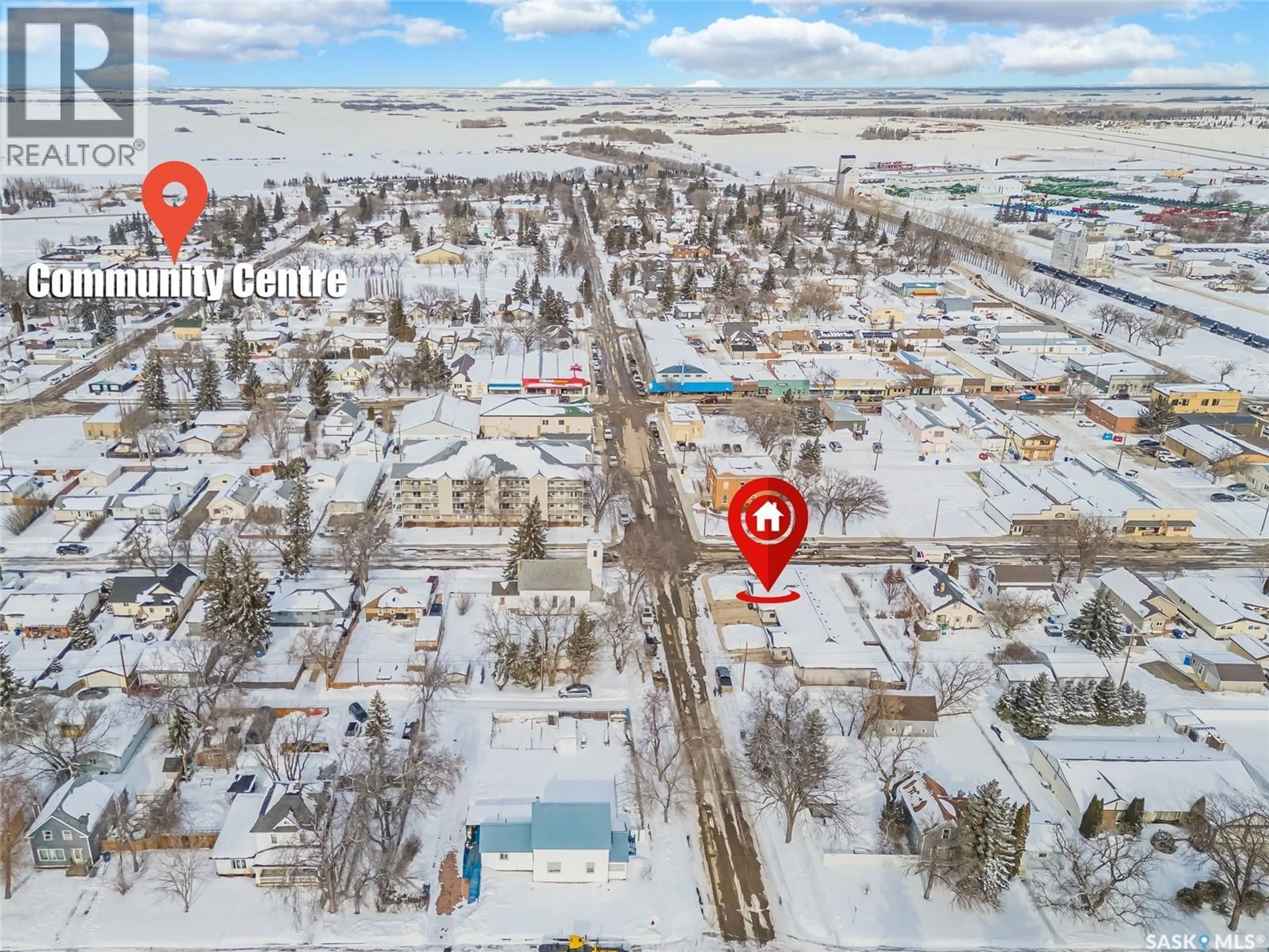 A pic from outside/outdoor area/front of a property/back of a property/a pic from drone, street for 801 1ST AVENUE, Rosthern Saskatchewan S0K4P0