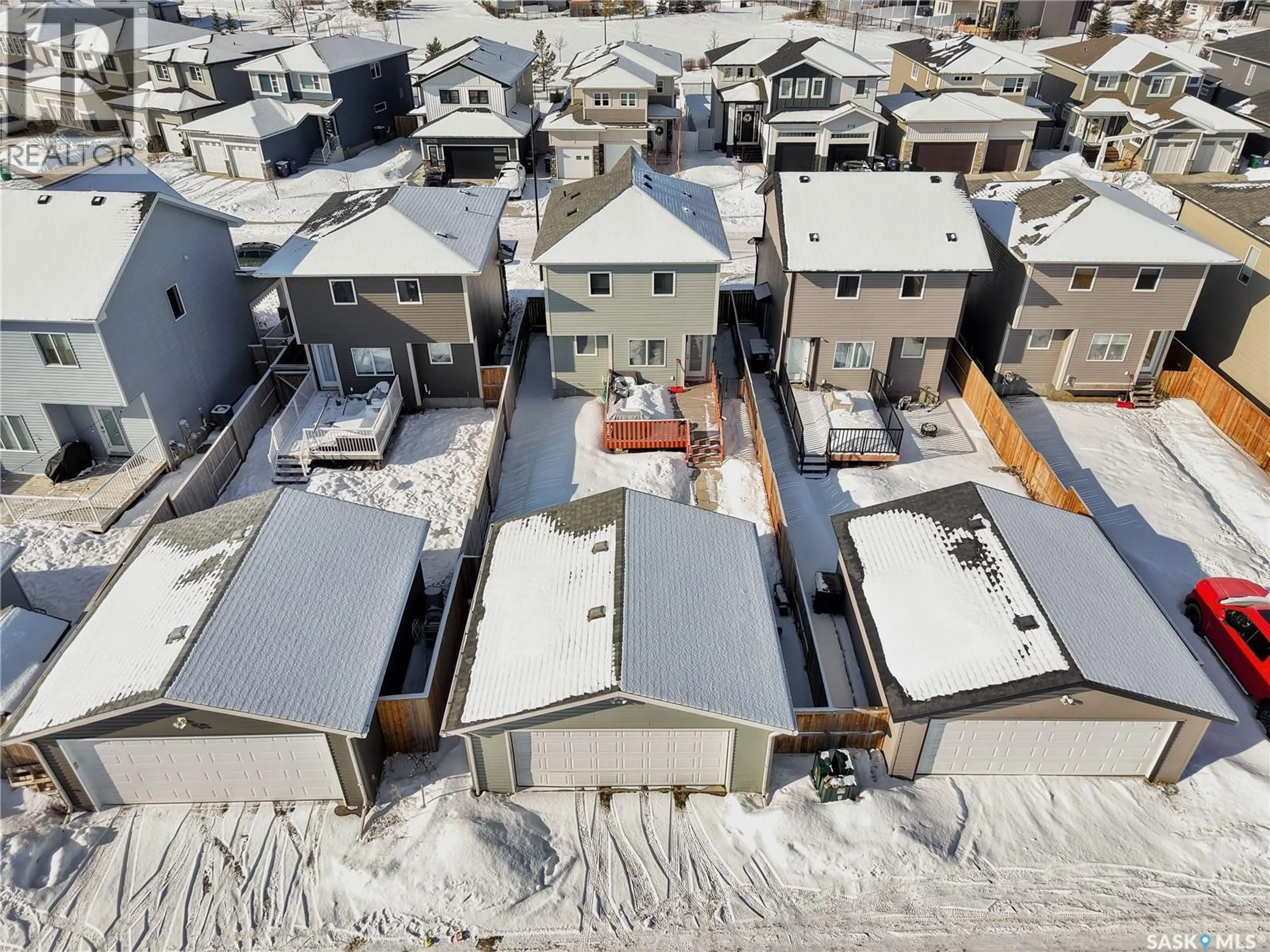 A pic from outside/outdoor area/front of a property/back of a property/a pic from drone, street for 321 SECORD WAY, Saskatoon Saskatchewan S7V0L9