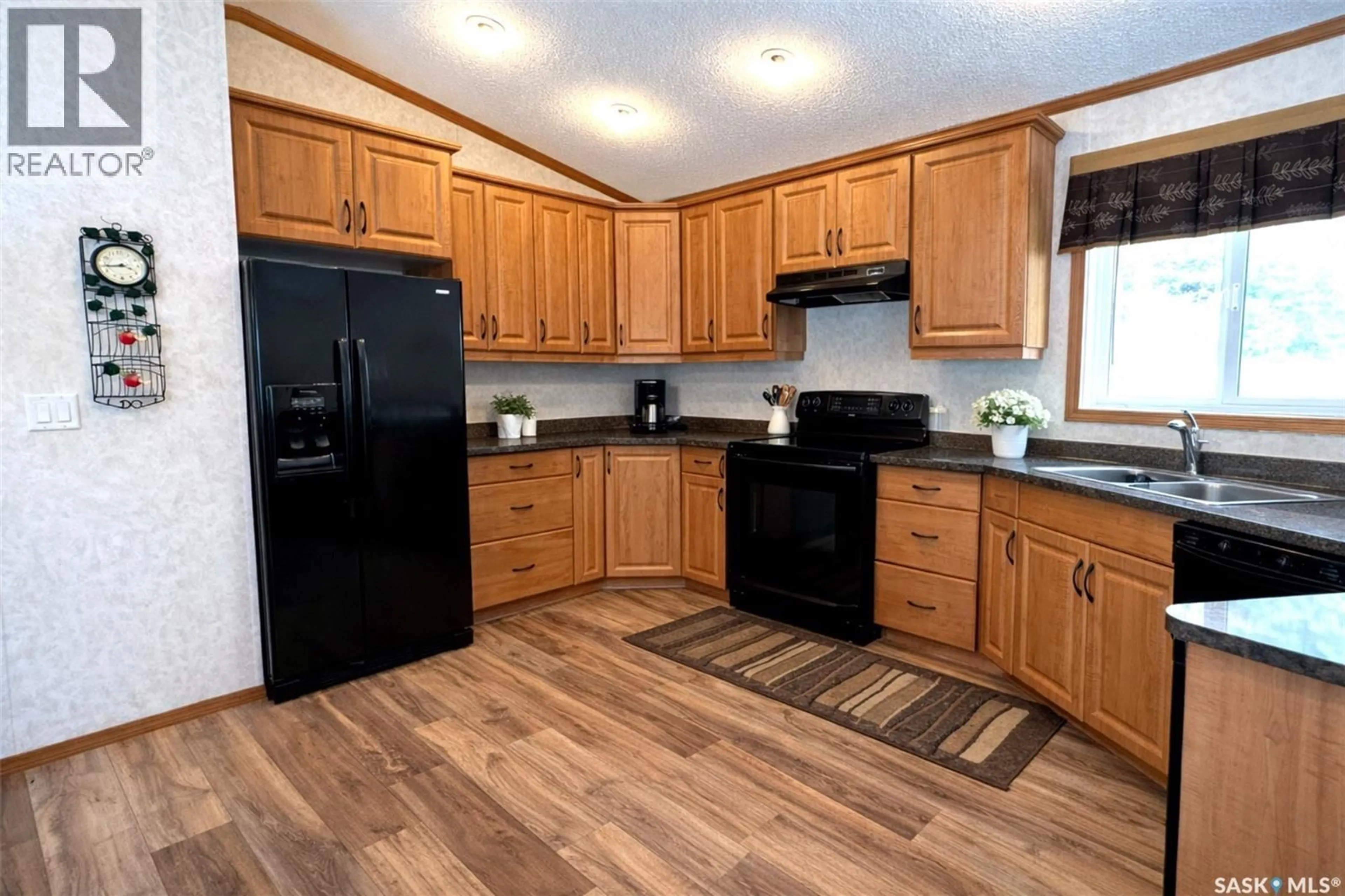 Standard kitchen, wood/laminate floor for 211 LIPTON STREET, Balcarres Saskatchewan S0G0C0