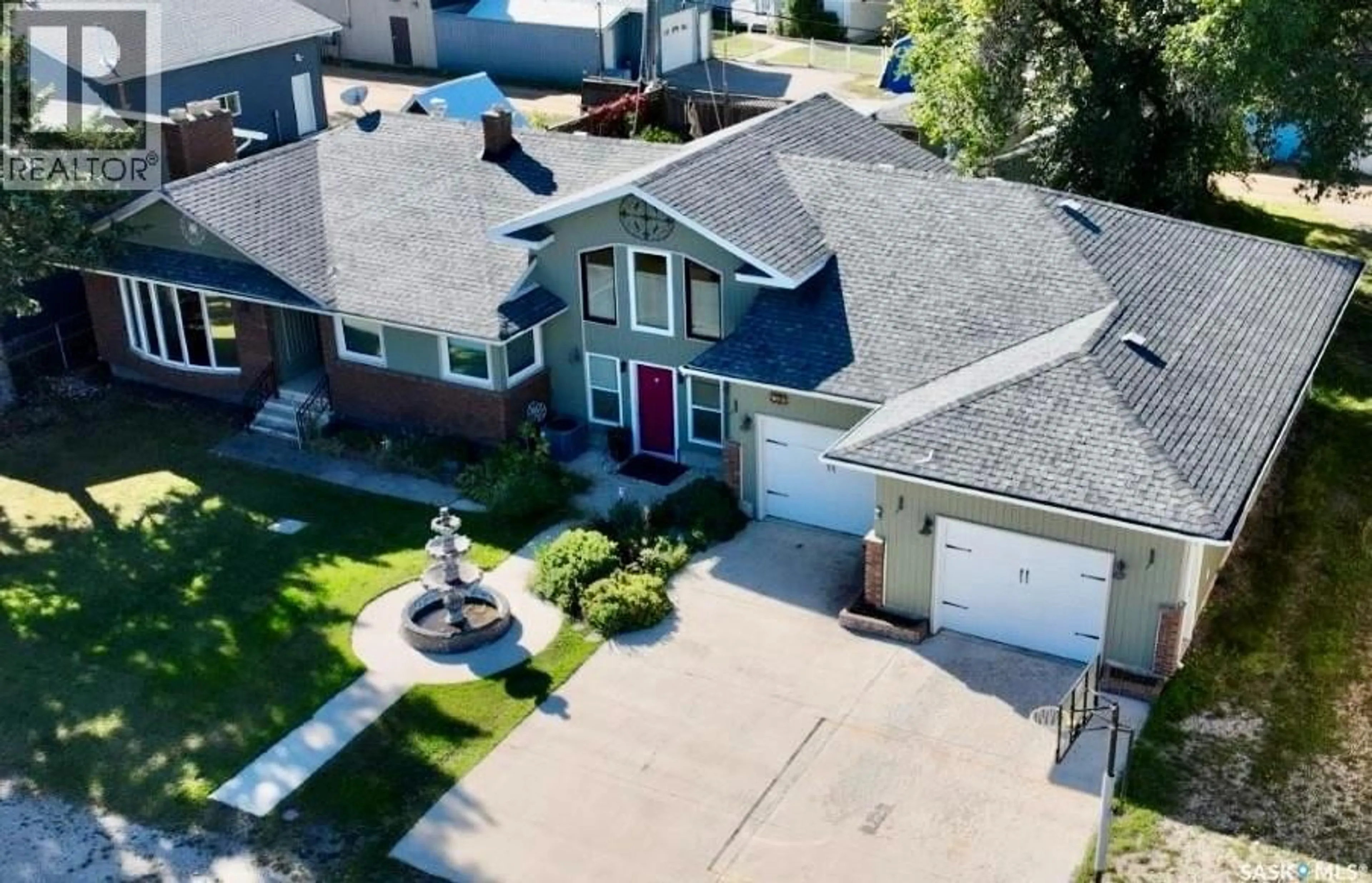 A pic from outside/outdoor area/front of a property/back of a property/a pic from drone, street for 309 PRINCE STREET, Hudson Bay Saskatchewan S0E0Y0