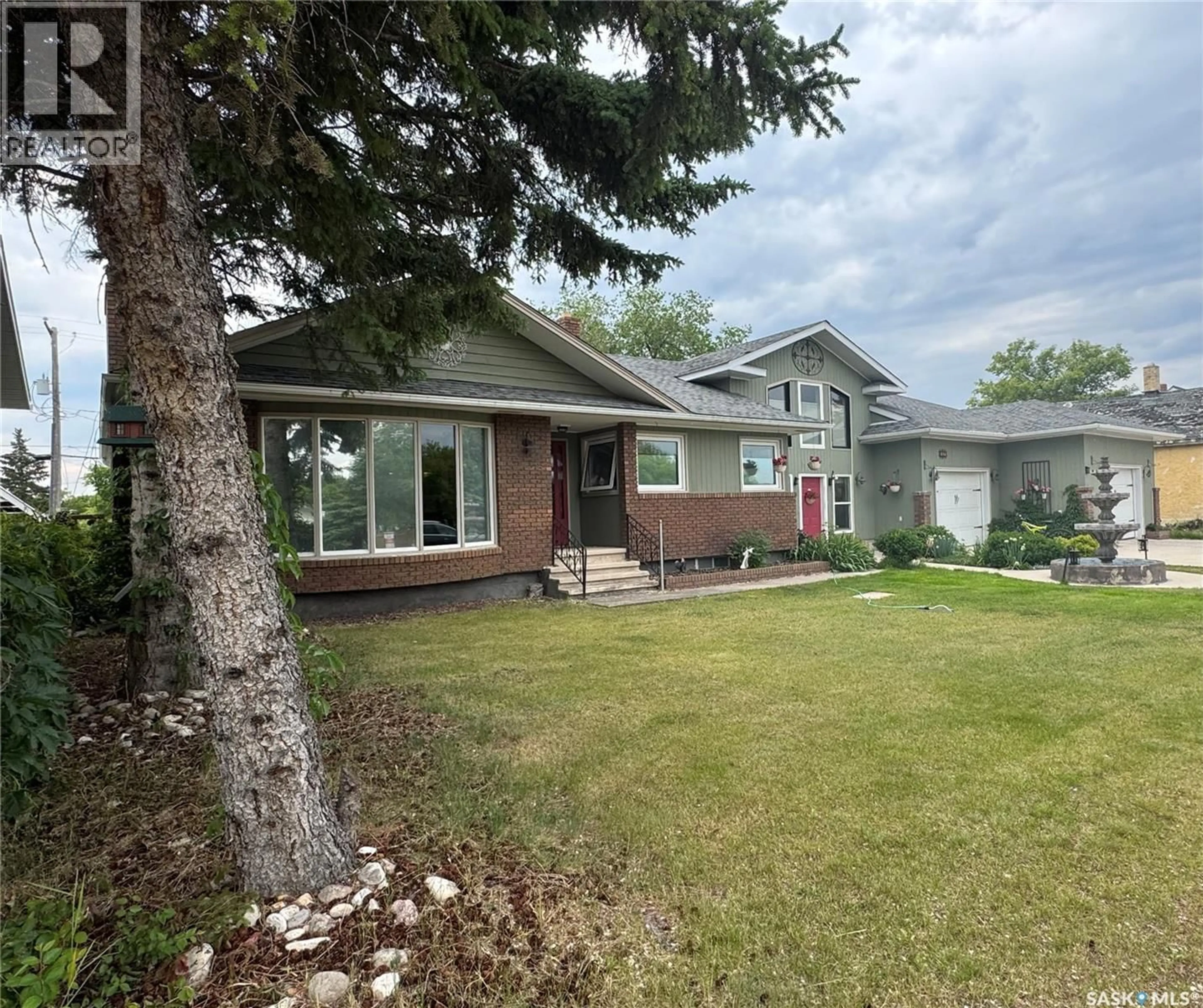 A pic from outside/outdoor area/front of a property/back of a property/a pic from drone, street for 309 PRINCE STREET, Hudson Bay Saskatchewan S0E0Y0