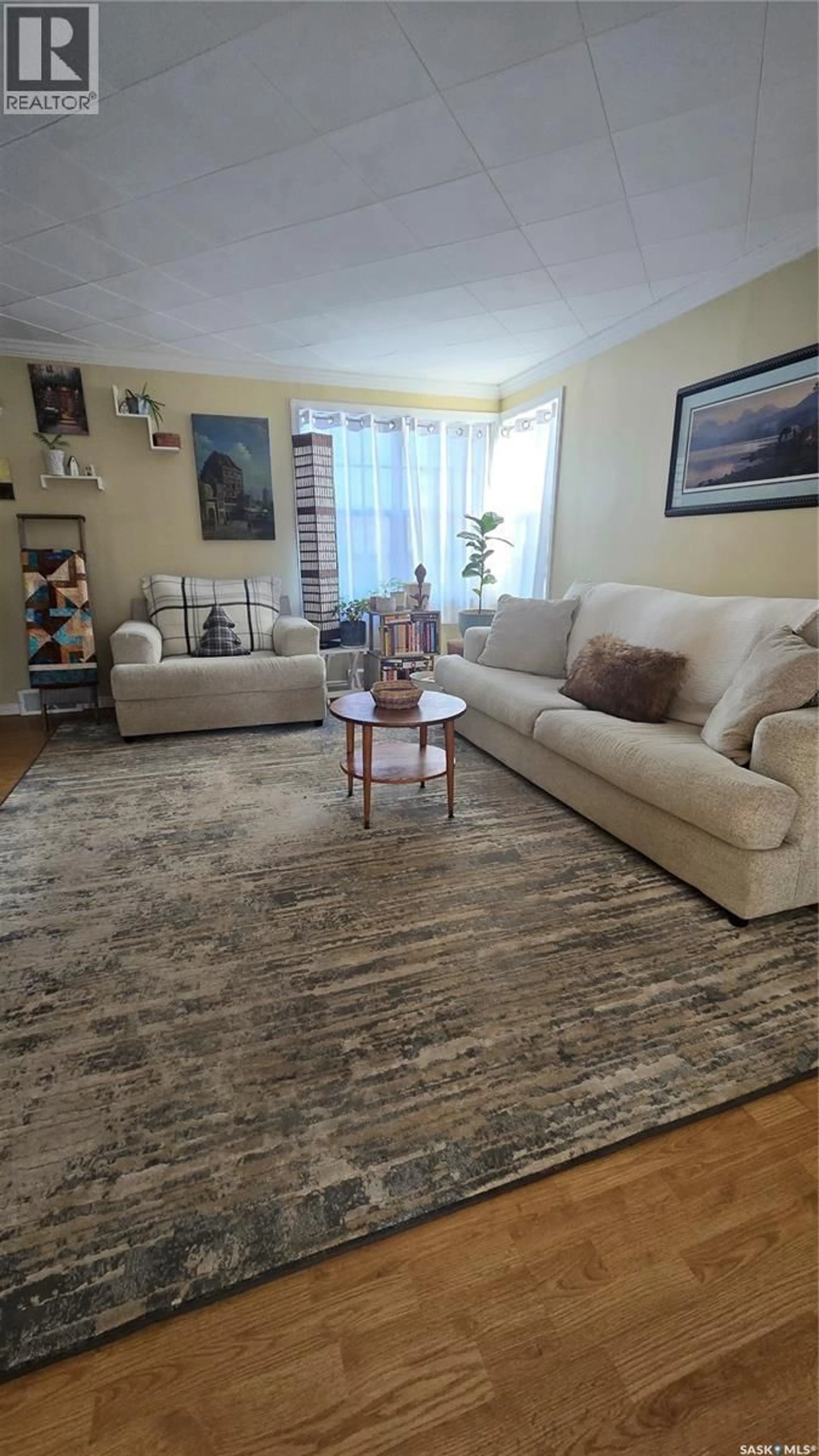Living room with furniture, carpet floor for 118 SECOND STREET, Carnduff Saskatchewan S0C0S0