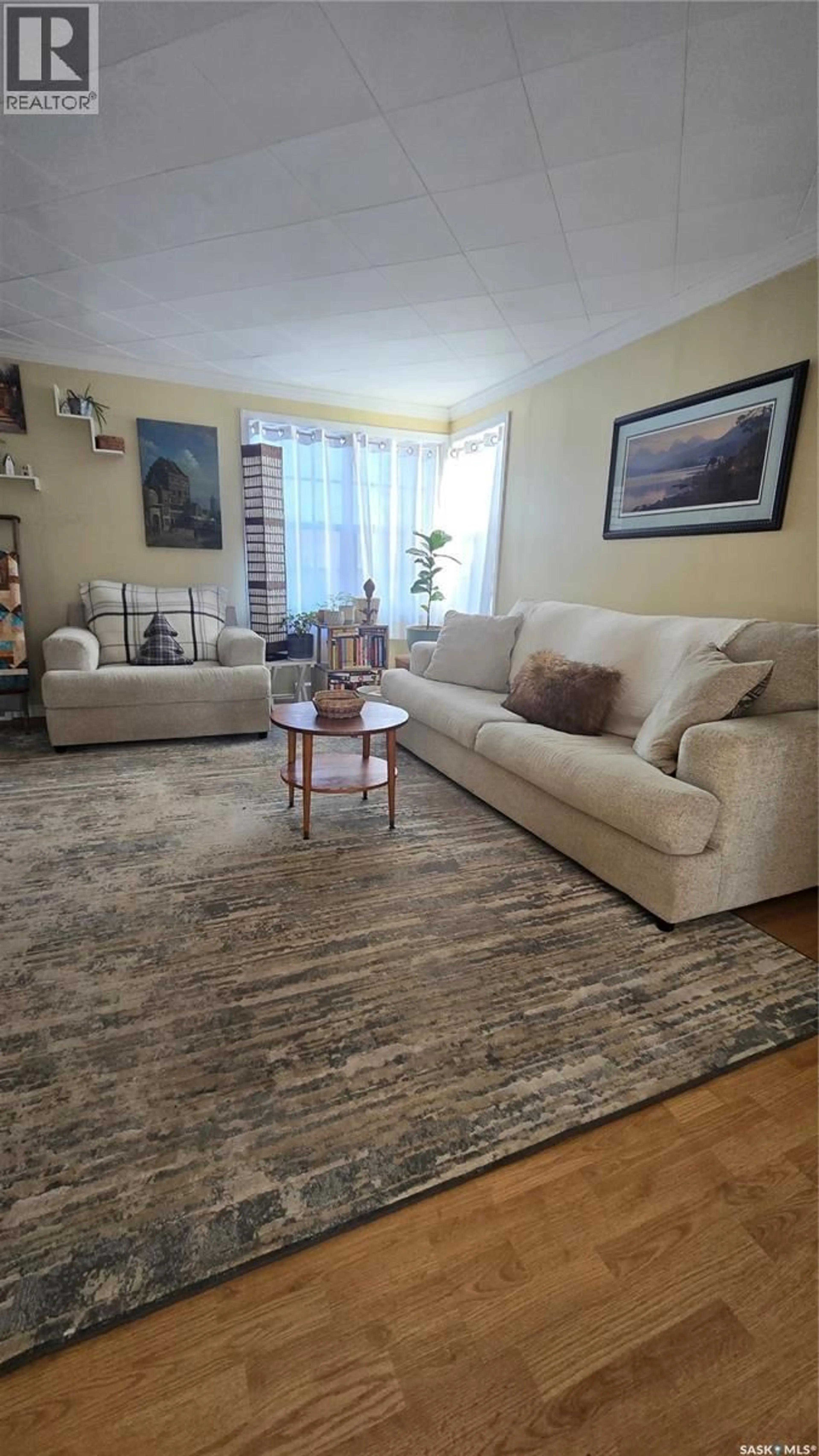 Living room with furniture, carpet floor for 118 SECOND STREET, Carnduff Saskatchewan S0C0S0