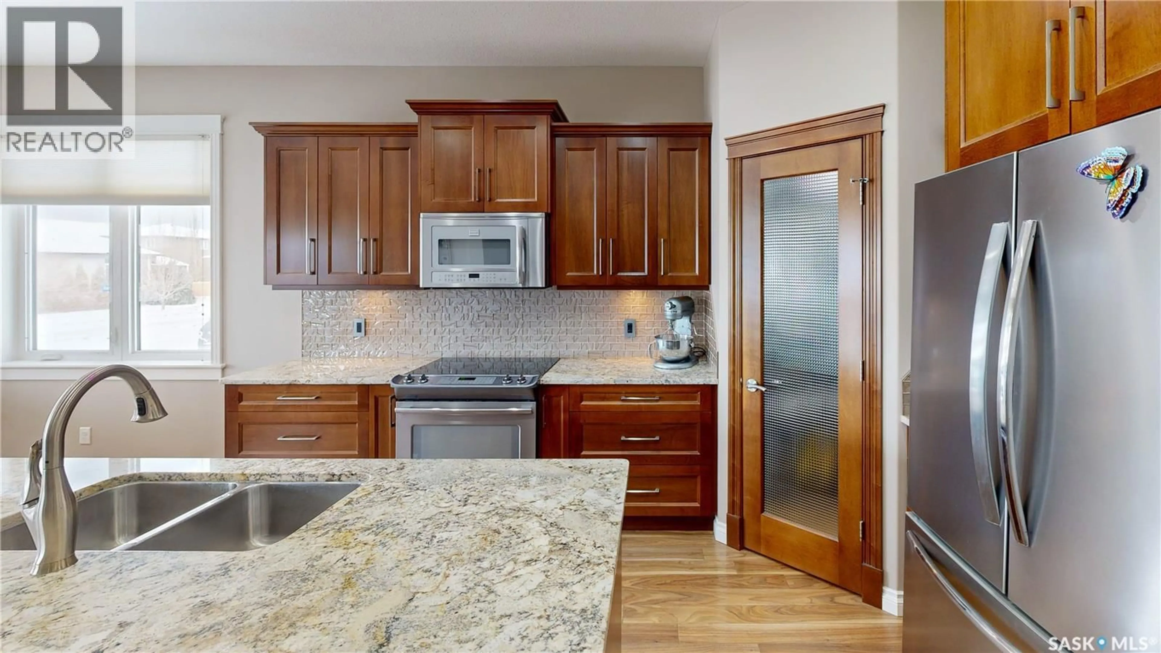 Open concept kitchen, ceramic/tile floor for 4342 SKINNER PLACE, Regina Saskatchewan S4W0A5