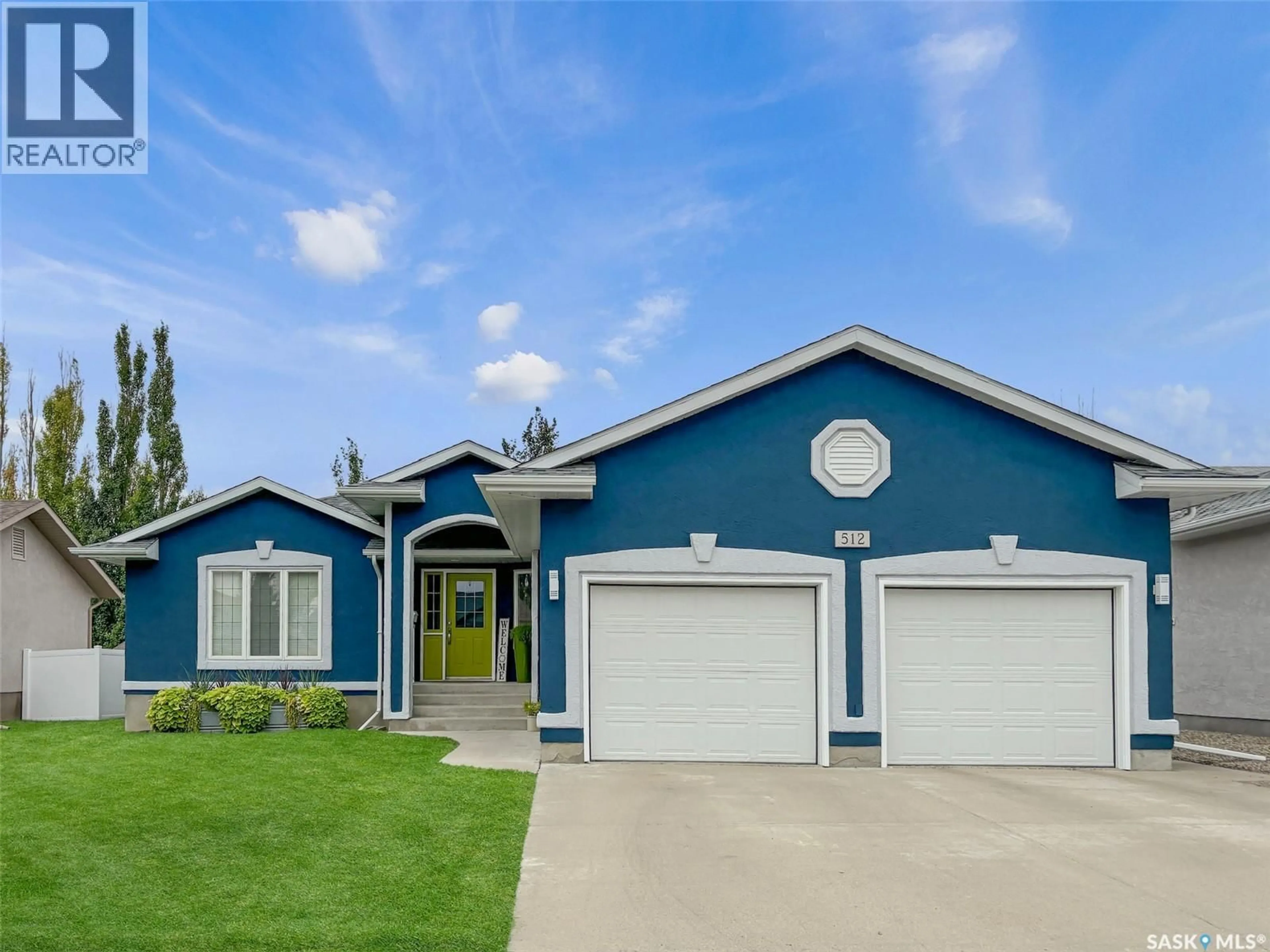Home with vinyl exterior material, street for 512 KEENE DRIVE, Swift Current Saskatchewan S9H0B4