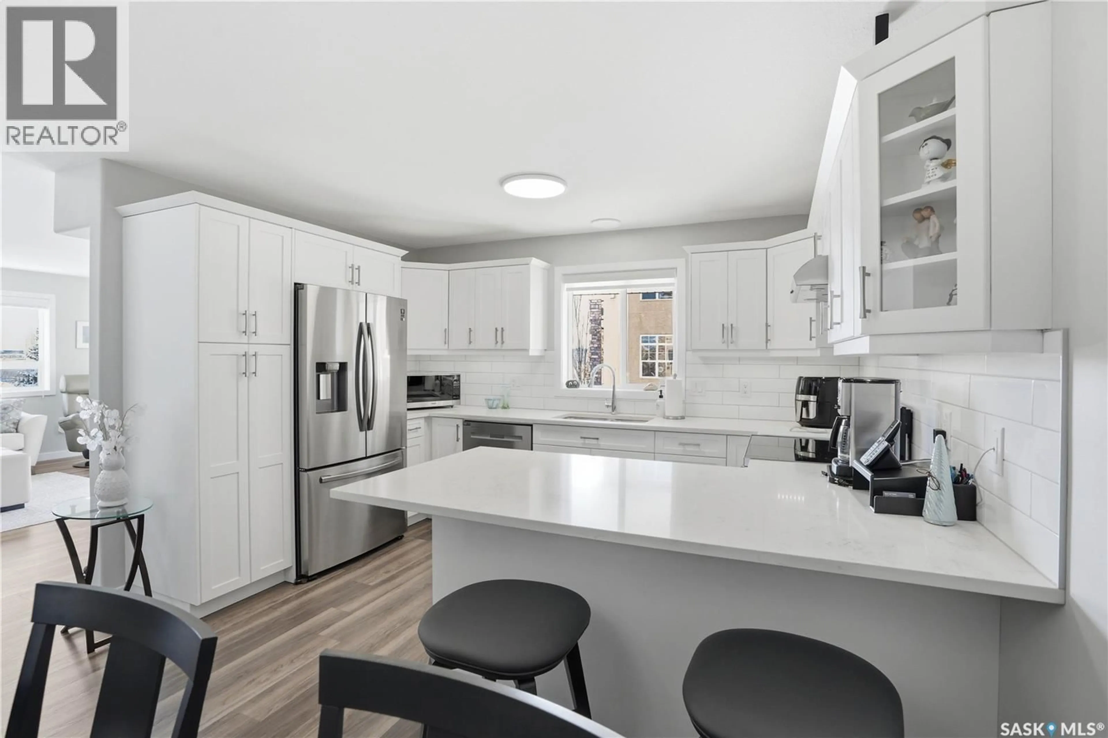 Open concept kitchen, ceramic/tile floor for 201 230 HEATH AVENUE, Saskatoon Saskatchewan S7S1N7