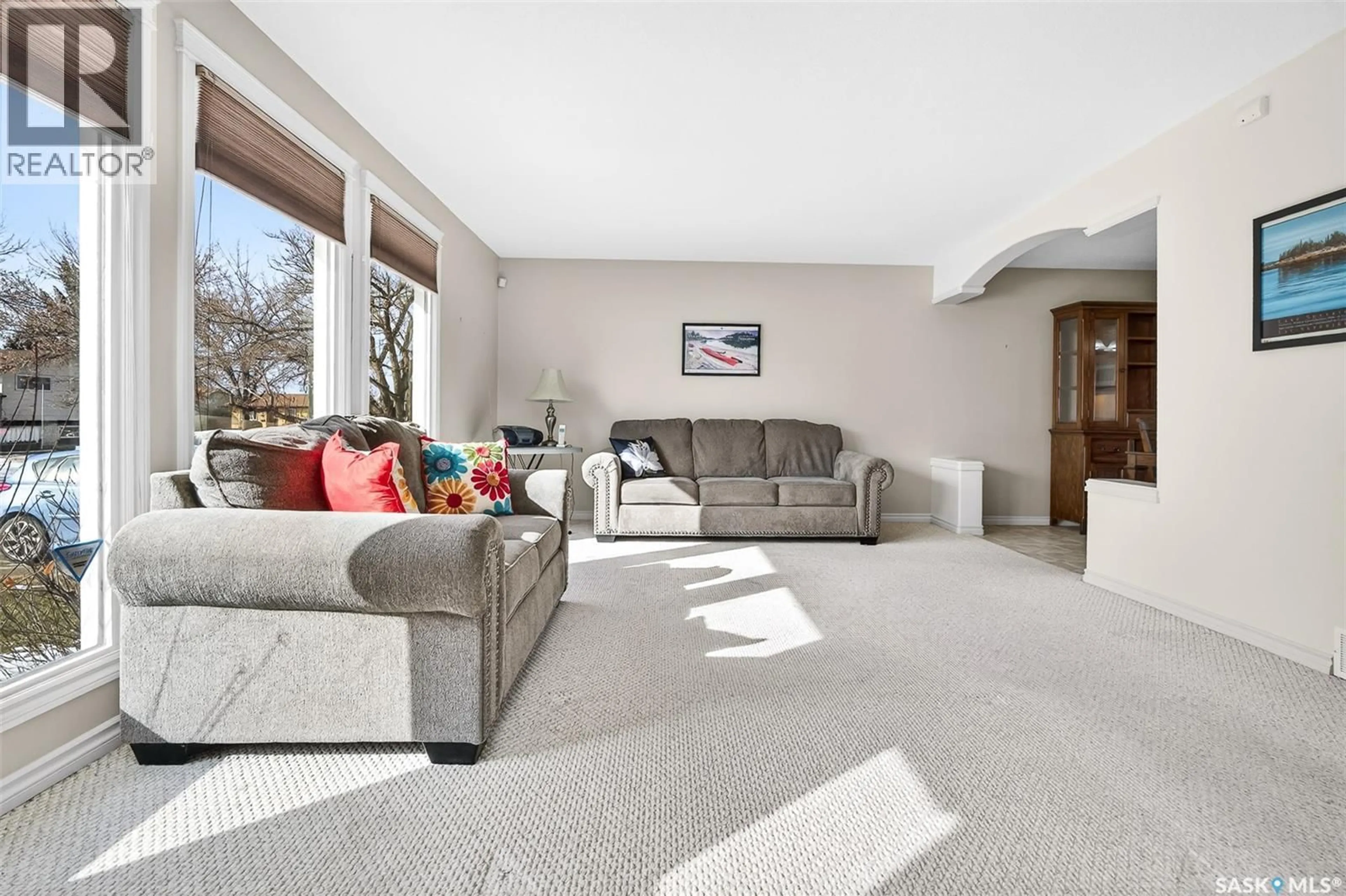 Living room with furniture, carpet floor for 1043 CORMAN CRESCENT, Moose Jaw Saskatchewan S6H6V5