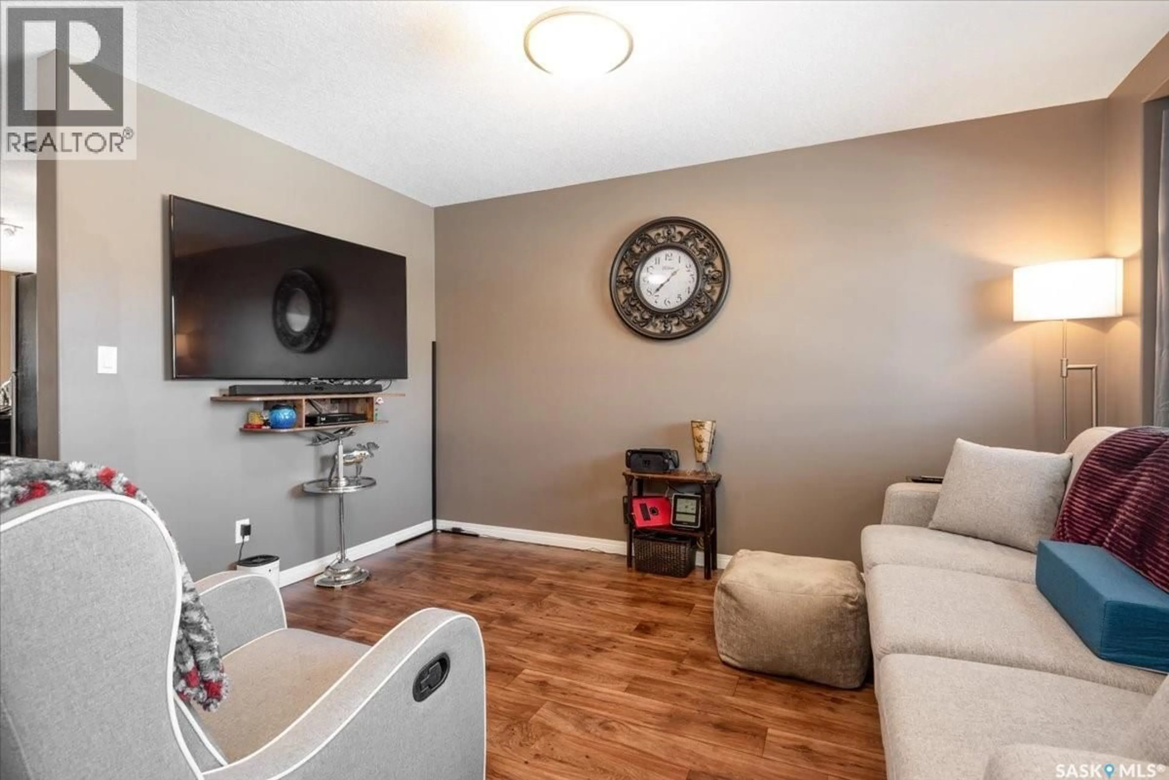 Living room with furniture, unknown for 3806 - 715 DEWDNEY AVENUE, Regina Saskatchewan S4Z0A6