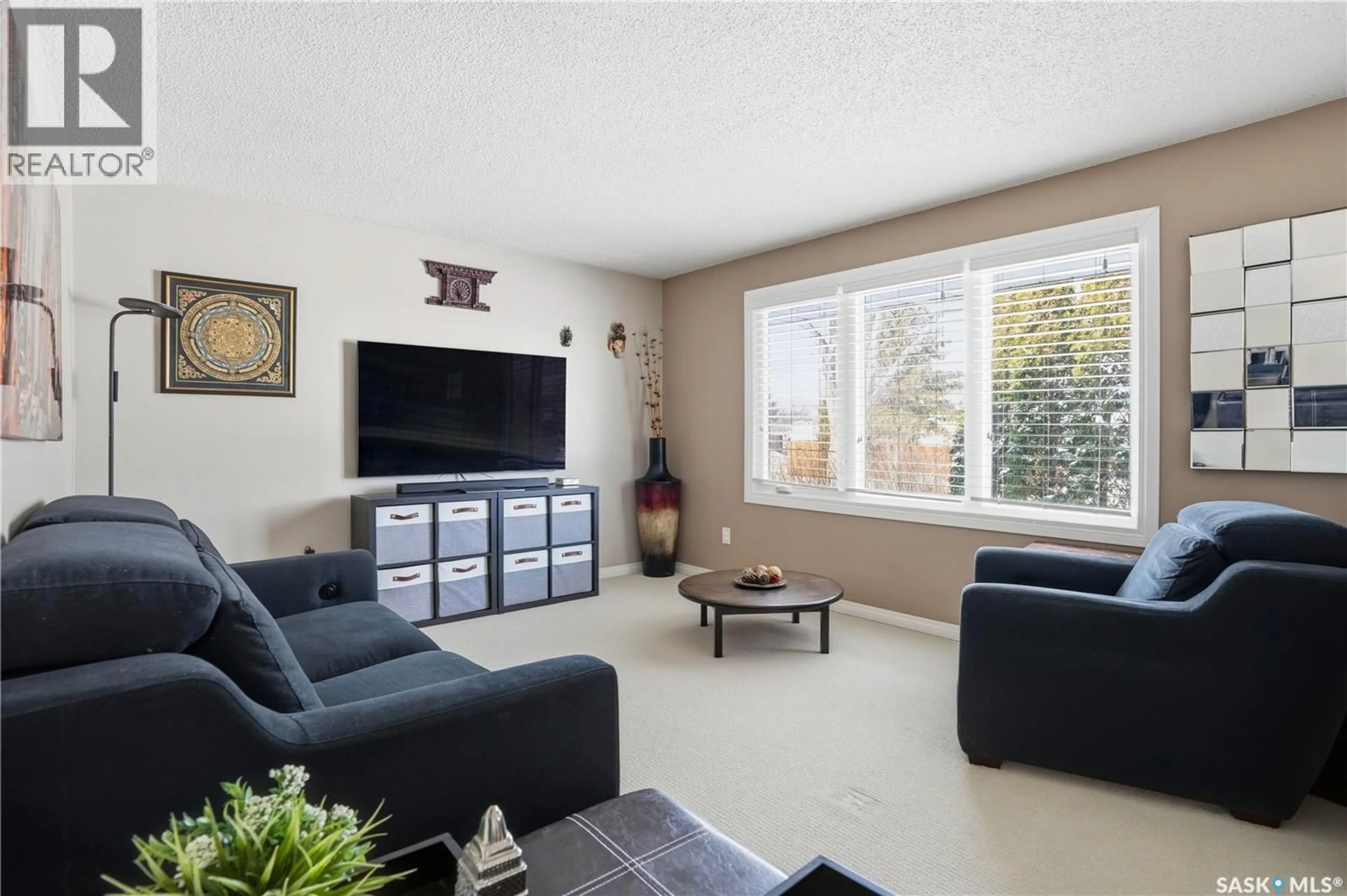 Living room with furniture, unknown for 39 PAYNTER CRESCENT, Regina Saskatchewan S4X1H5