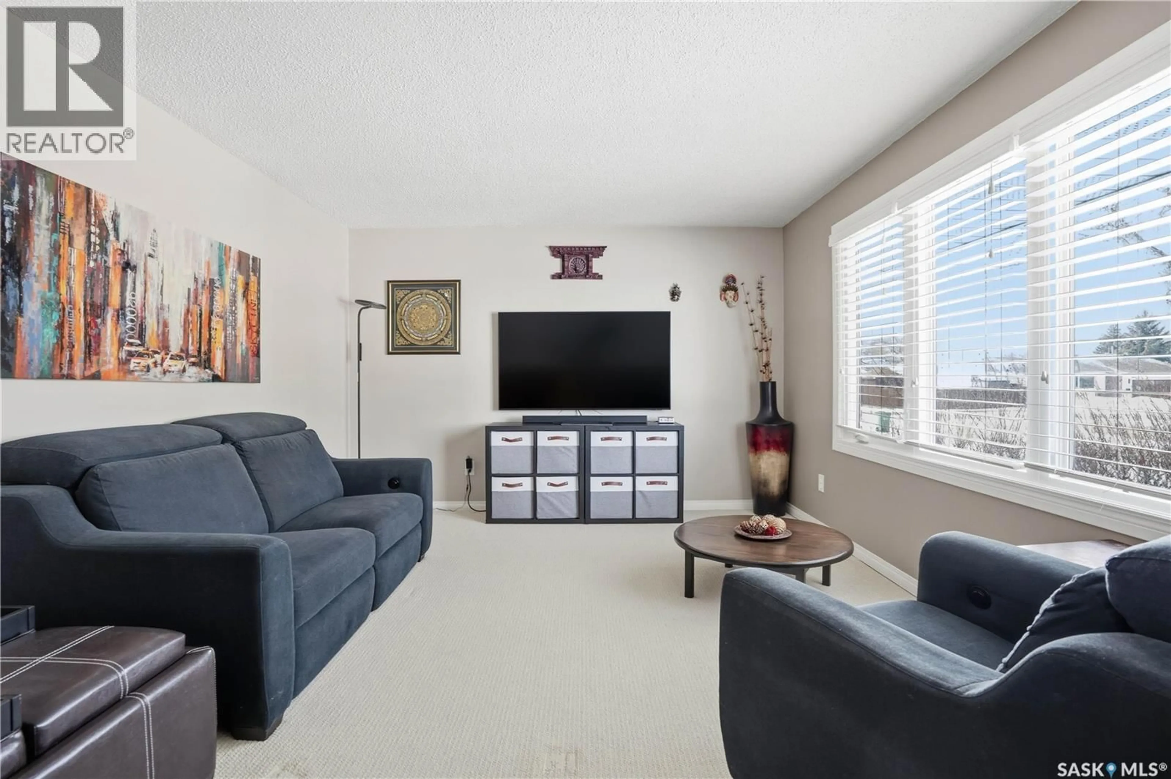 Living room with furniture, unknown for 39 PAYNTER CRESCENT, Regina Saskatchewan S4X1H5