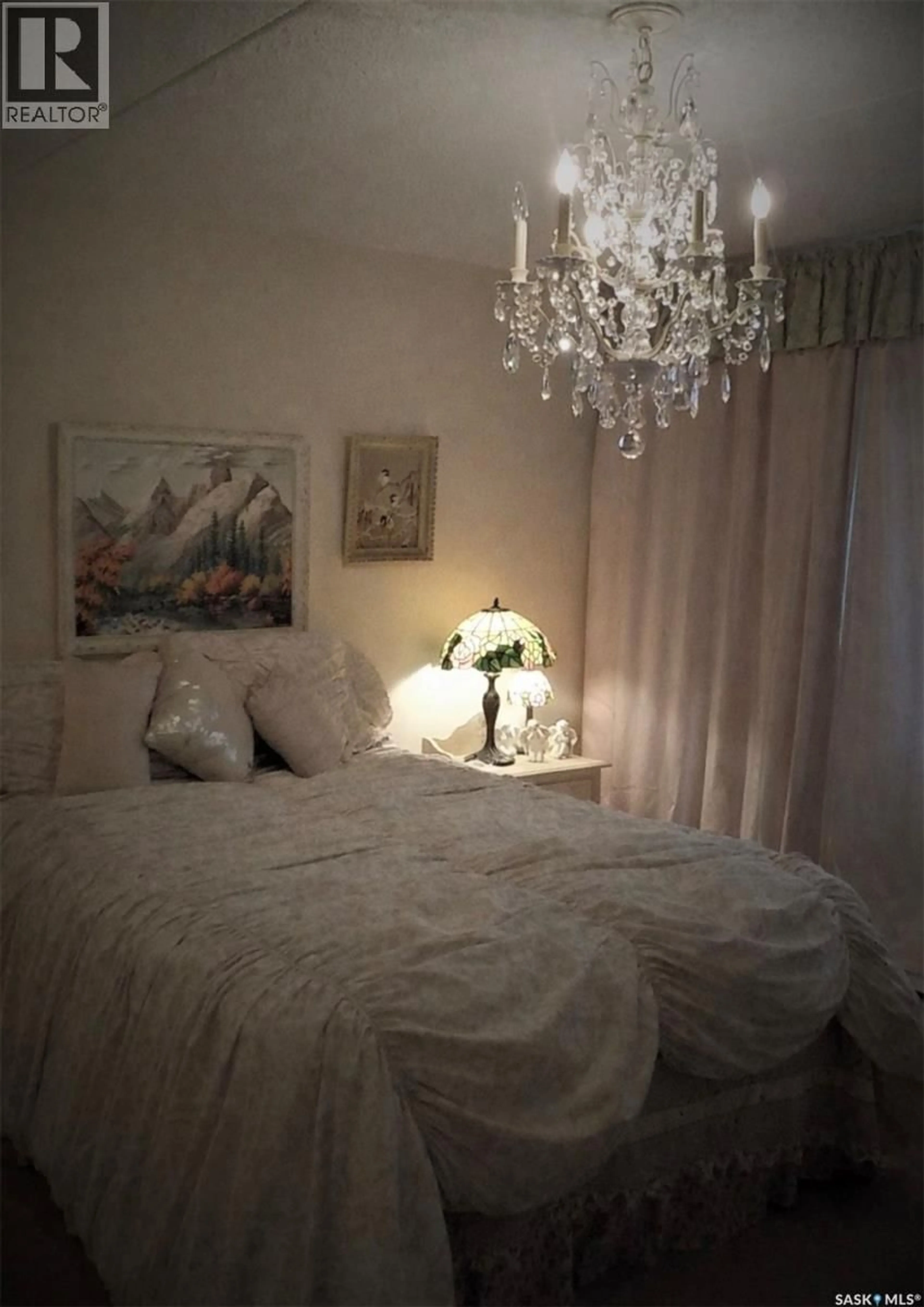 Bedroom with bed, wood/laminate floor for 3520 - 1805 HILLSDALE STREET, Regina Saskatchewan S4S5Z5