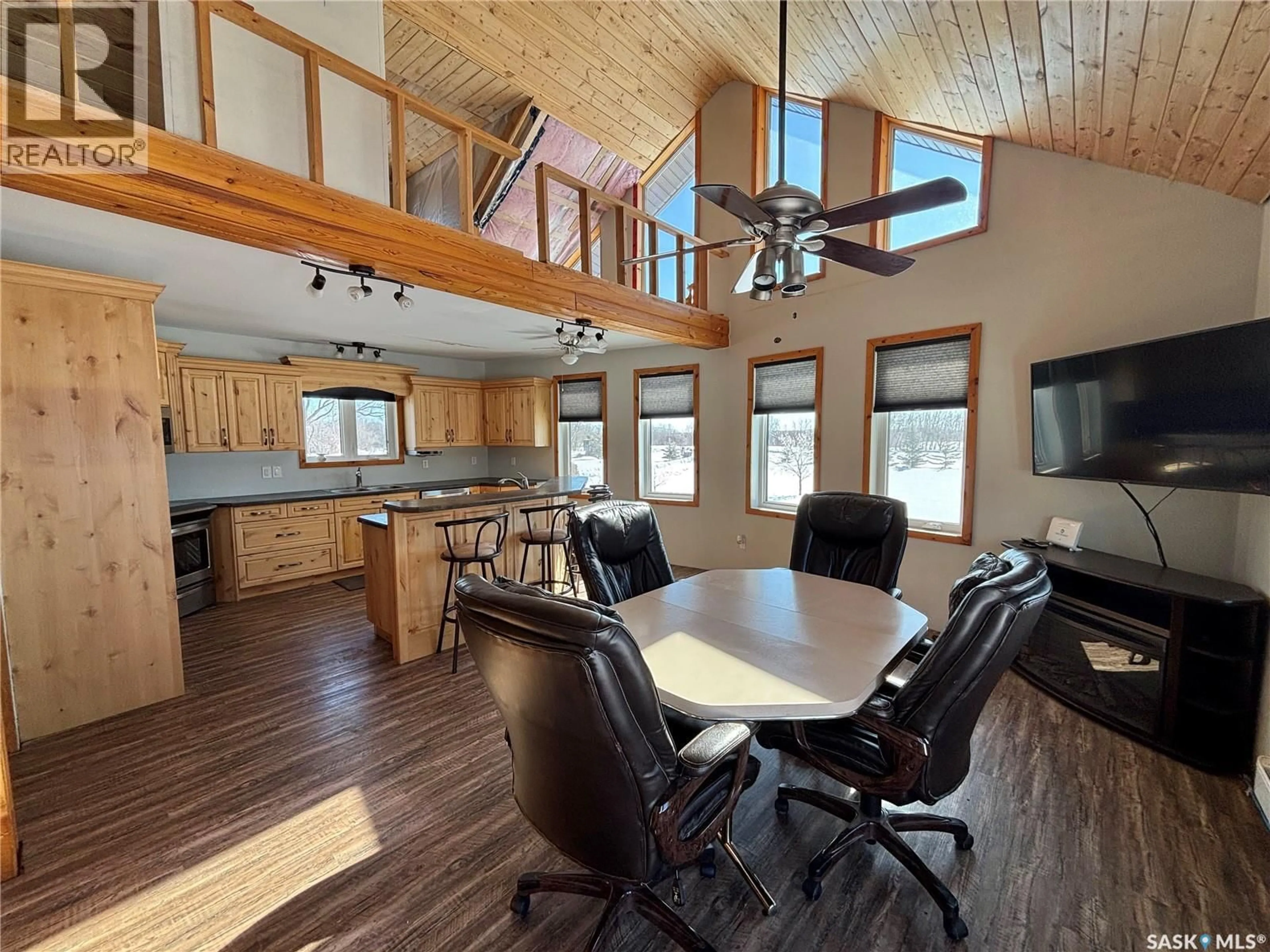 Open concept kitchen, wood/laminate floor for GOOD LAKE HAVEN ACREAGE, Good Lake Rm No. 274 Saskatchewan S0A3V0