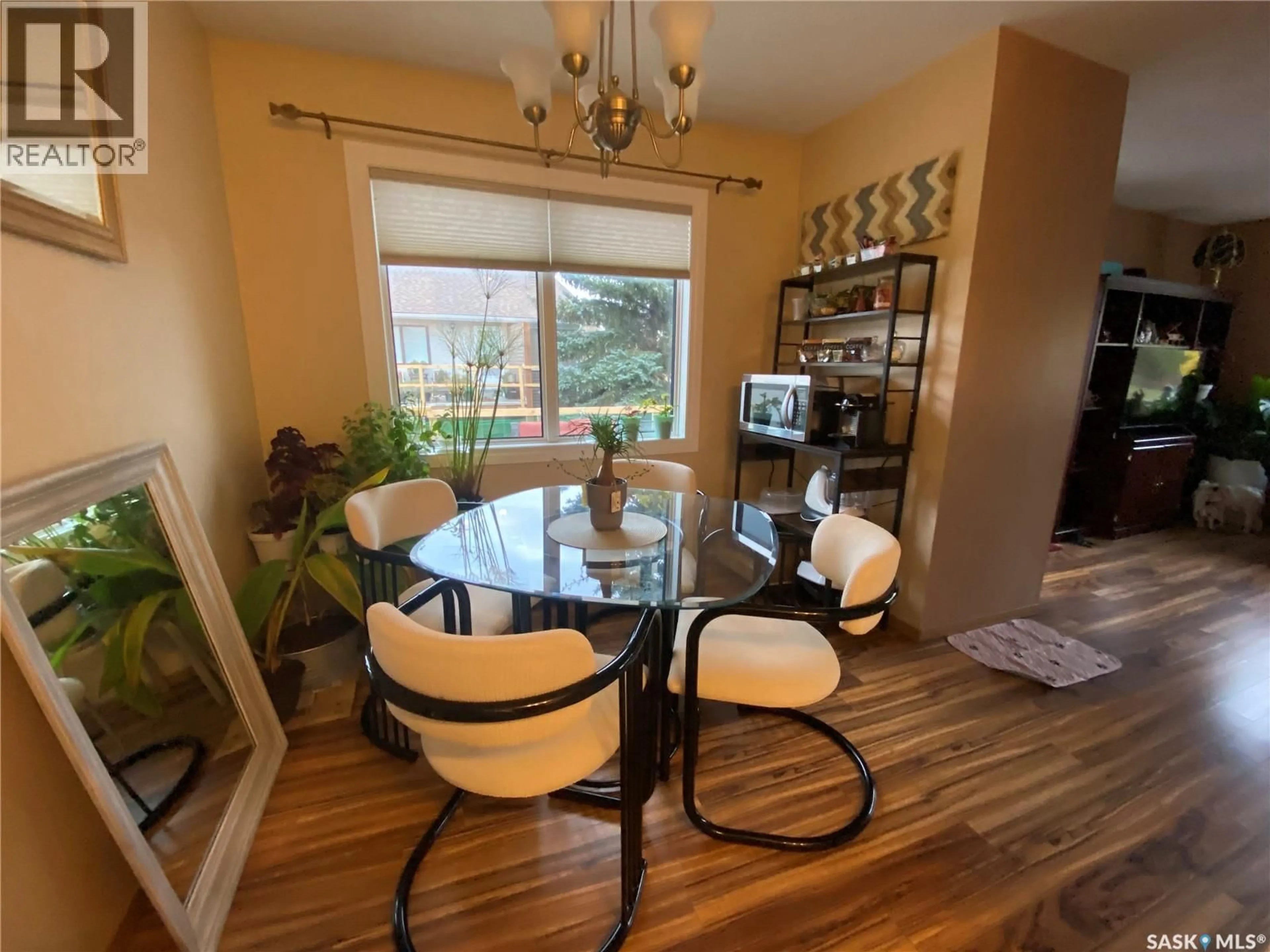 Dining room, wood/laminate floor for 6946 BLAKENEY DRIVE, Regina Saskatchewan S4X2N5