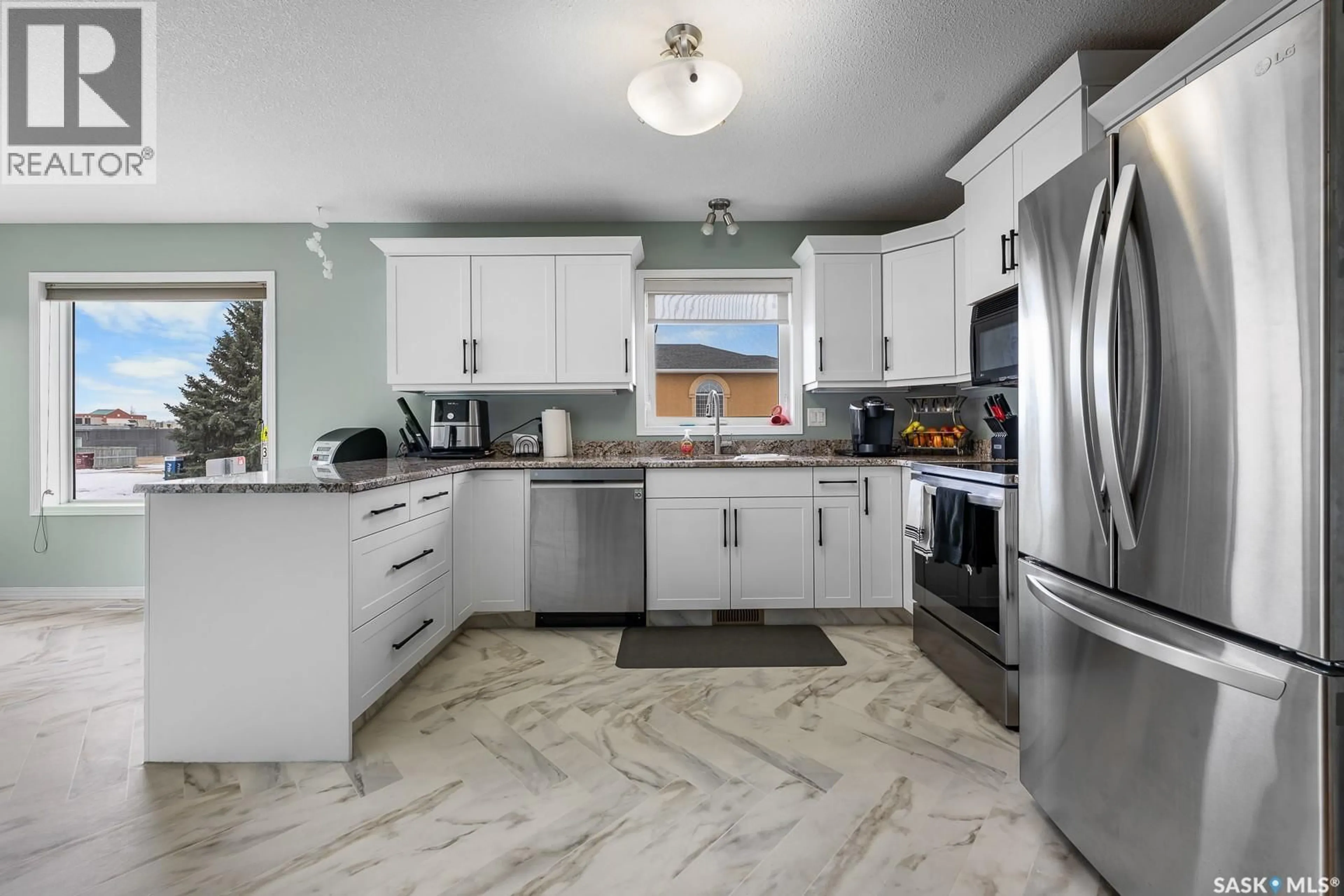 Open concept kitchen, ceramic/tile floor for 3103 ST JAMES ROAD, Regina Saskatchewan S4V3B3