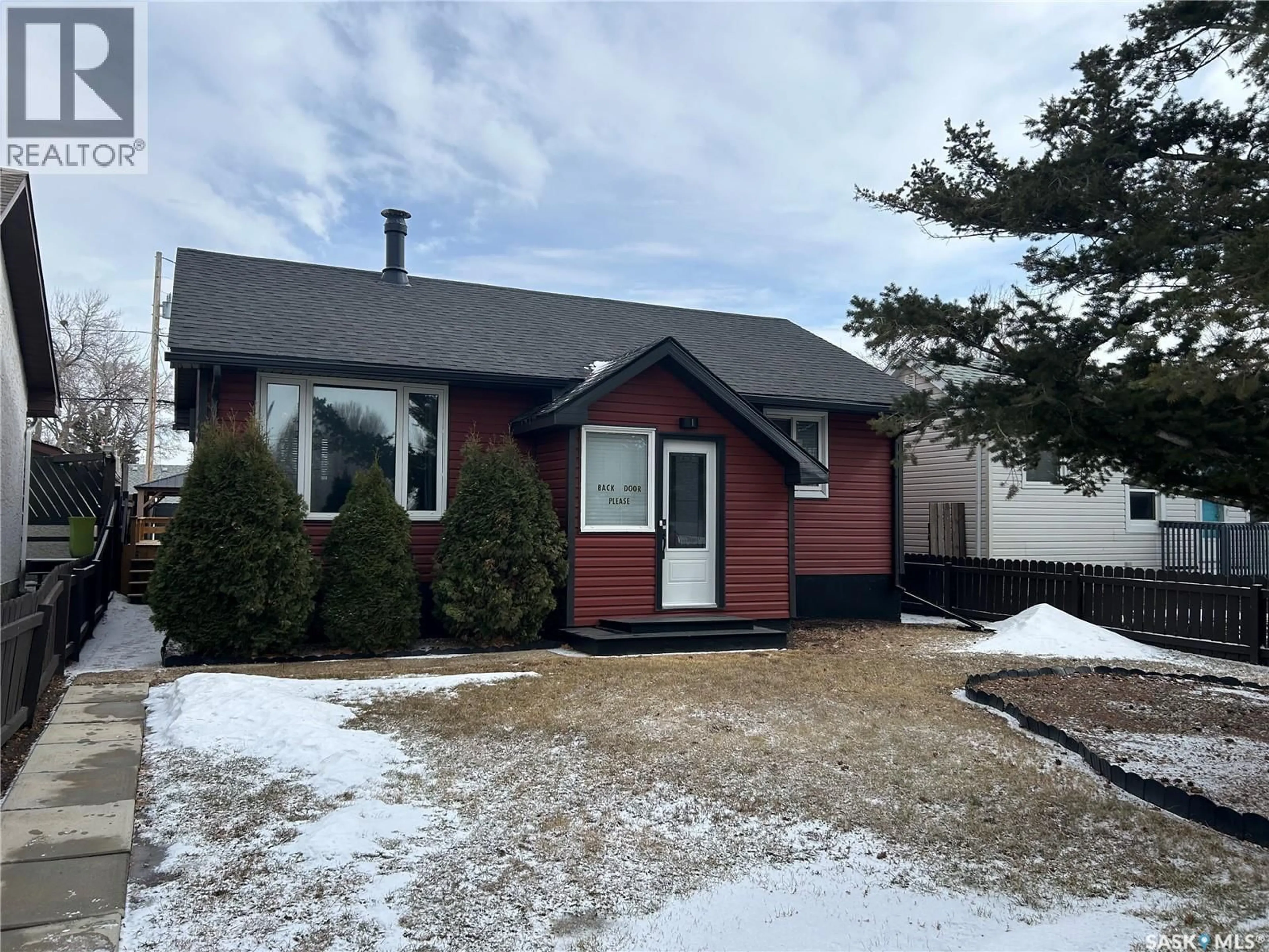 Home with vinyl exterior material, street for 891 CARTIER AVENUE, Moose Jaw Saskatchewan S6H1L9