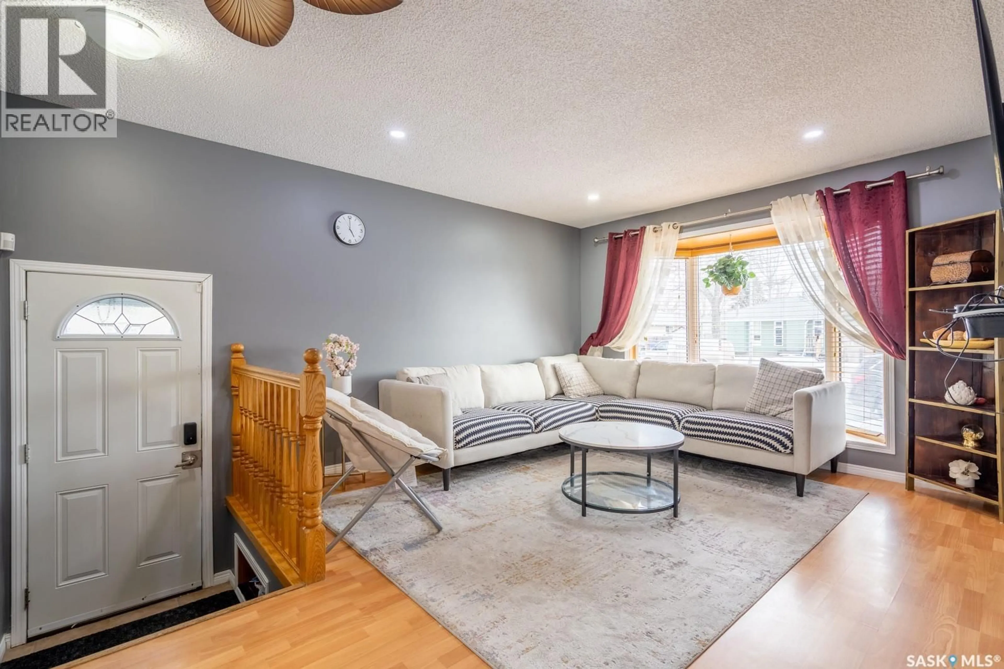 Living room with furniture, unknown for 174 THOMSON AVENUE, Regina Saskatchewan S4N5L3