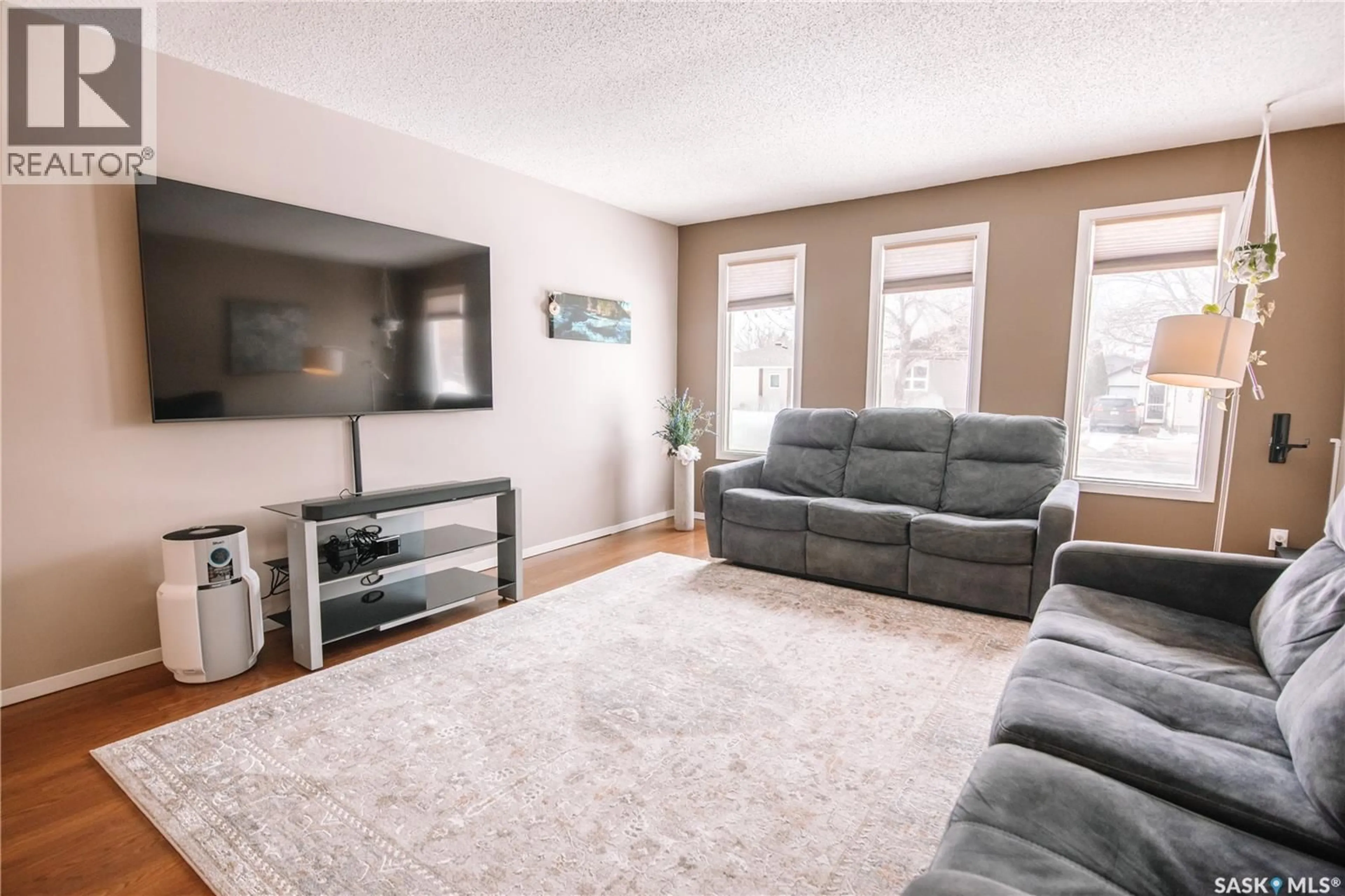 Living room with furniture, unknown for 203 PAYNTER CRESCENT, Regina Saskatchewan S4X2A9