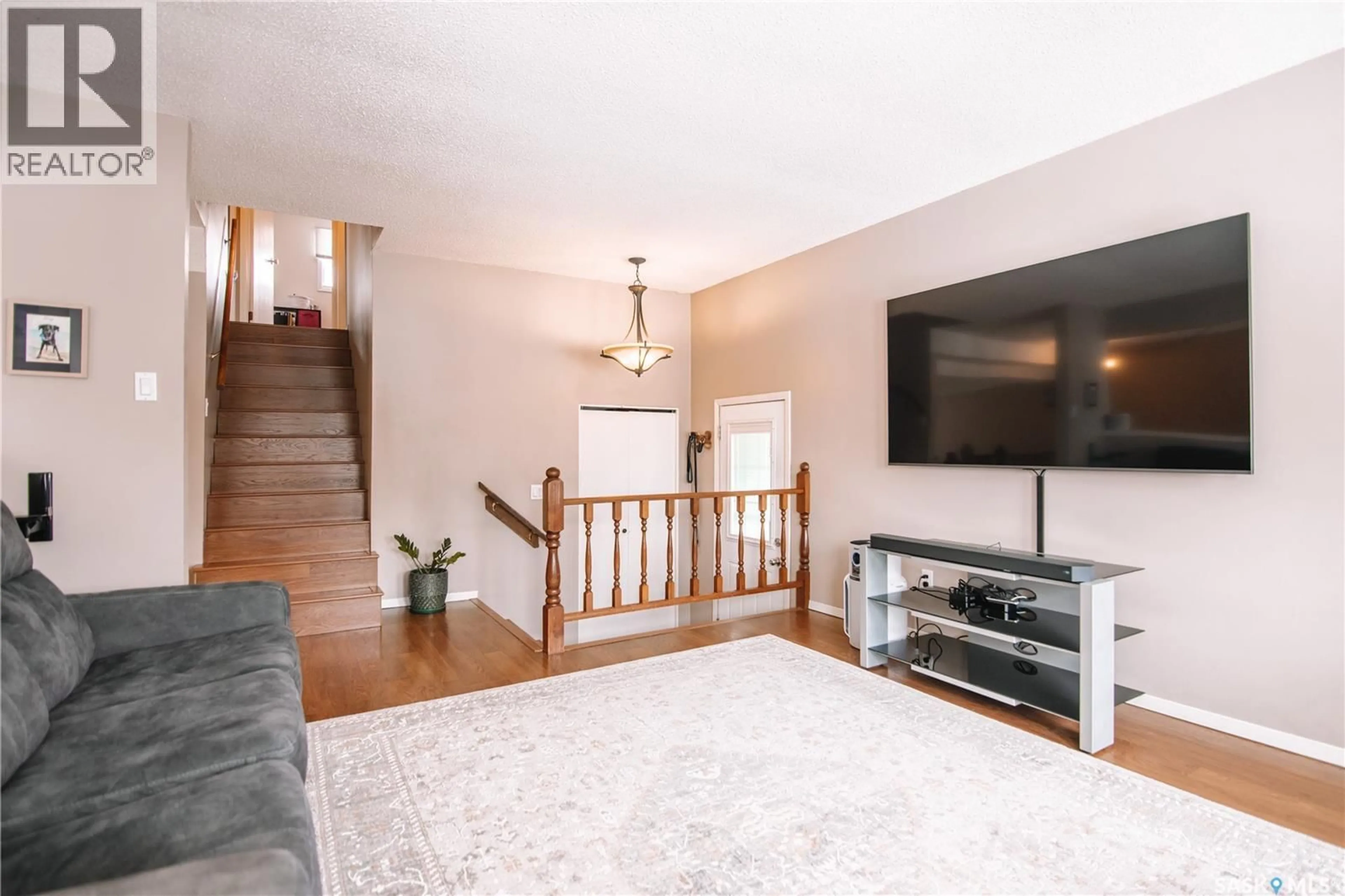 Living room with furniture, unknown for 203 PAYNTER CRESCENT, Regina Saskatchewan S4X2A9