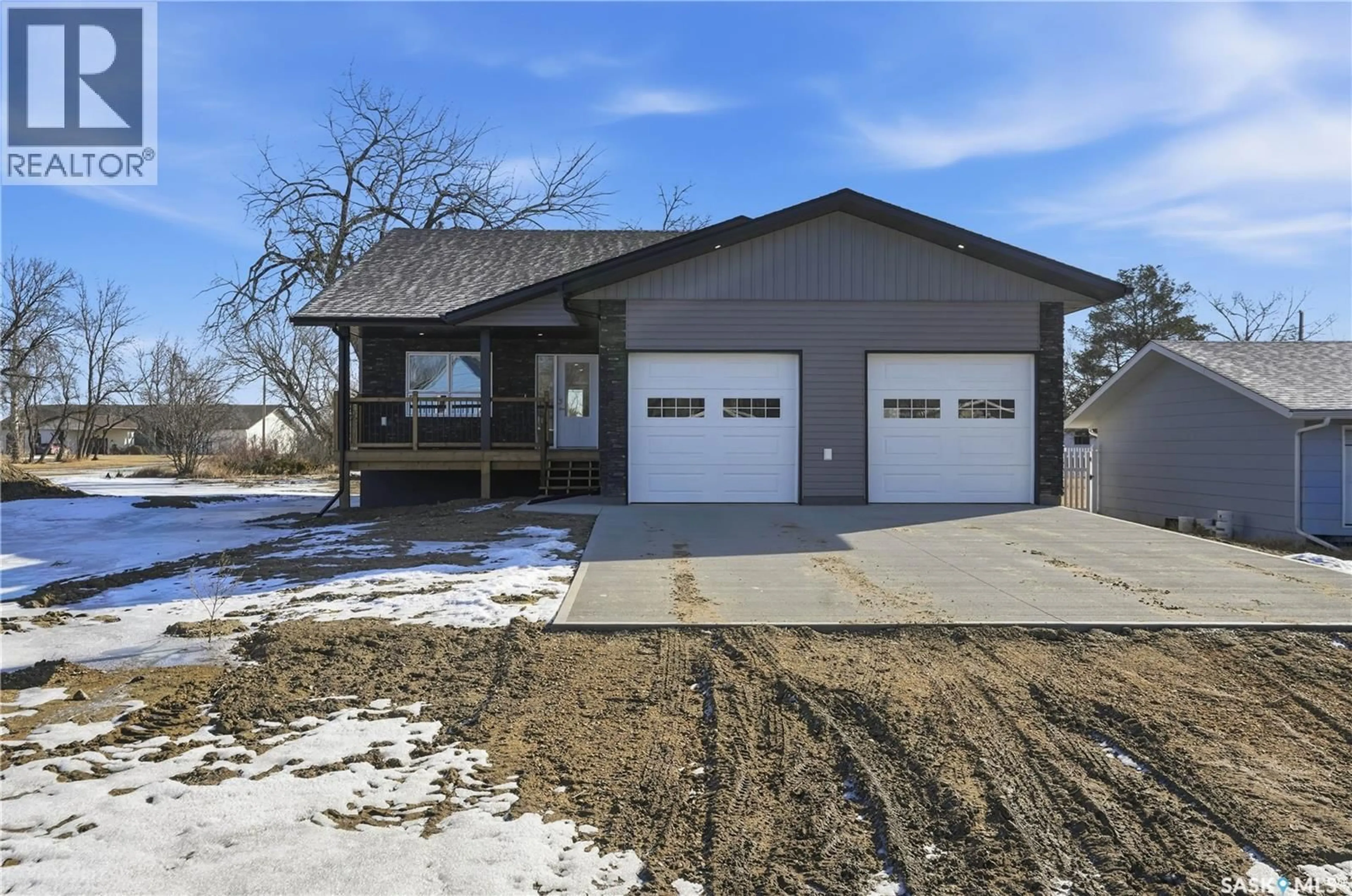 Home with brick exterior material, street for 117 KHAMIS STREET, Mortlach Saskatchewan S0H3E0
