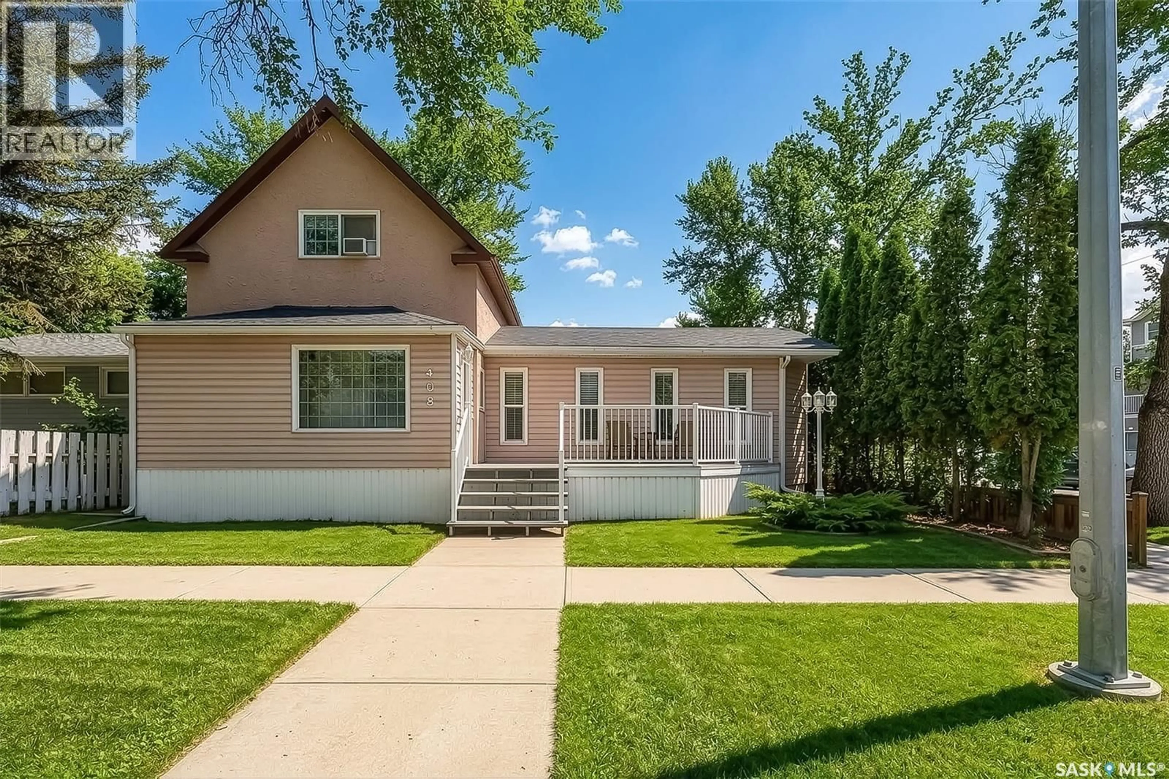 Home with vinyl exterior material, street for 408 DUFFIELD STREET, Moose Jaw Saskatchewan S6H5H8