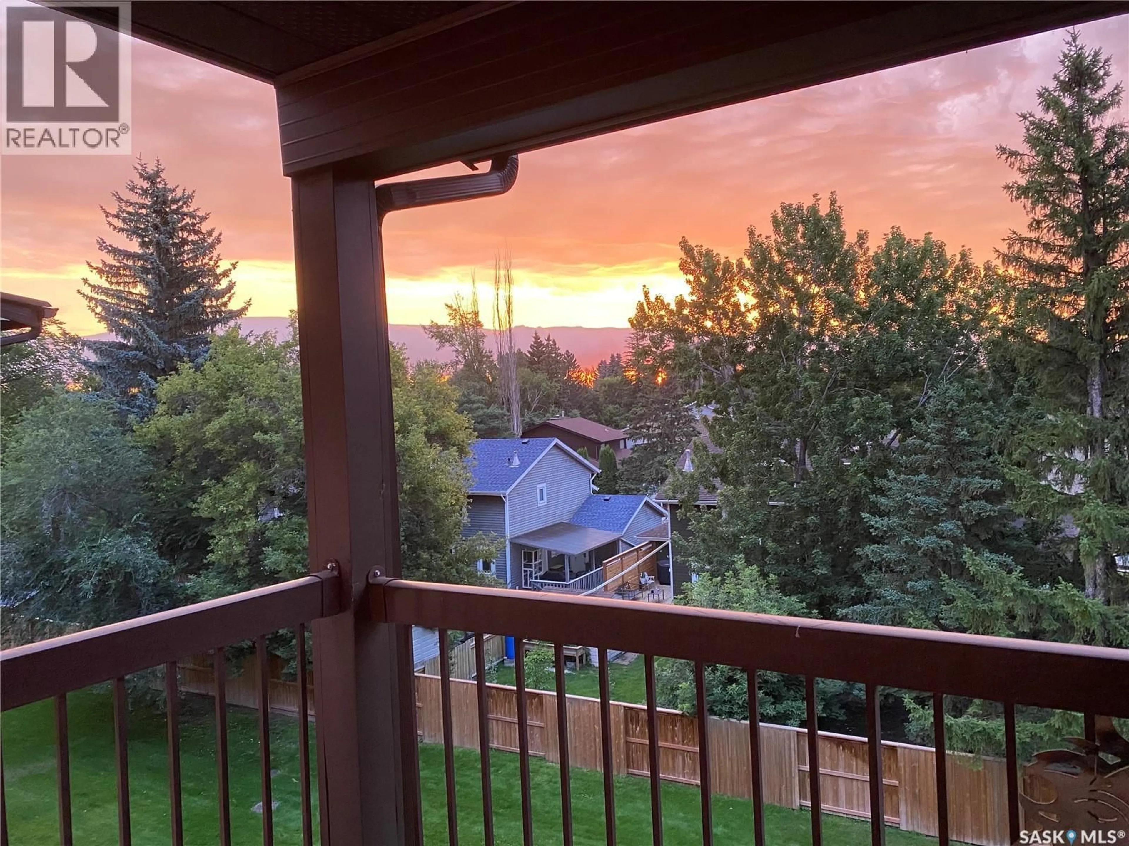 A pic from outside/outdoor area/front of a property/back of a property/a pic from drone, mountain view for 385 - 303 KINGSMERE BOULEVARD, Saskatoon Saskatchewan S7J4J6