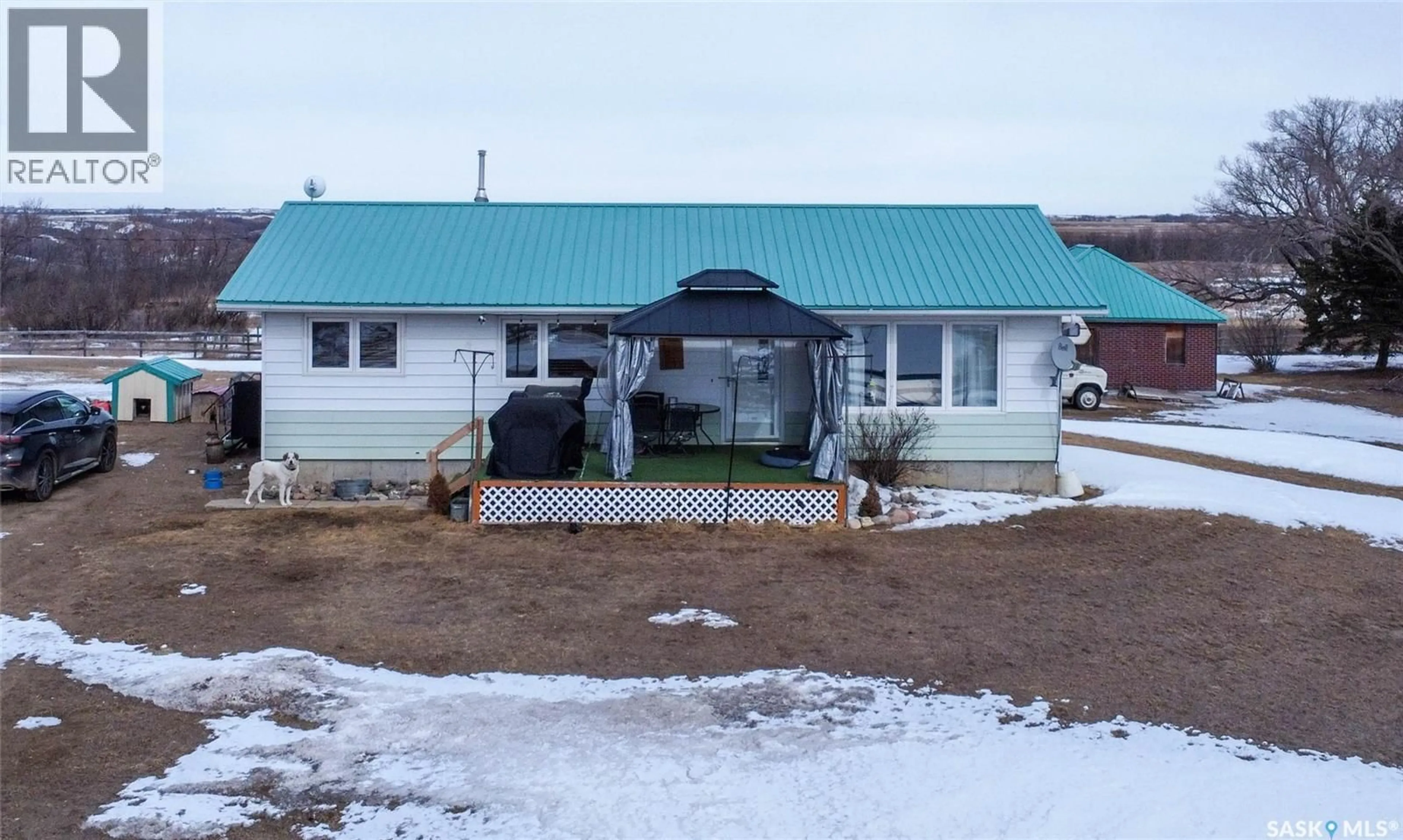 A pic from outside/outdoor area/front of a property/back of a property/a pic from drone, building for HOWELL ACREAGE, Lumsden Rm No. 189 Saskatchewan S0G3C0