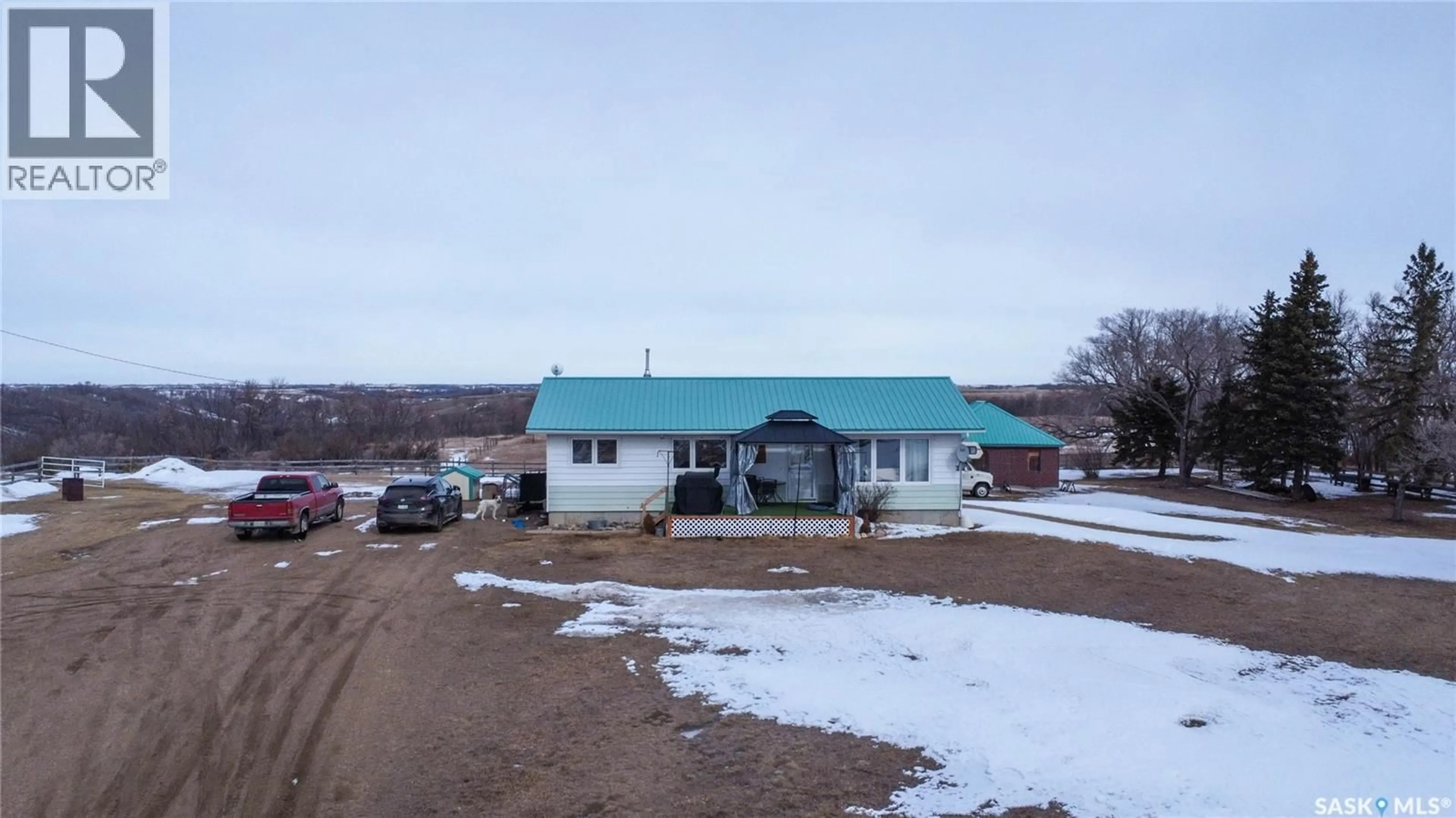 A pic from outside/outdoor area/front of a property/back of a property/a pic from drone, unknown for HOWELL ACREAGE, Lumsden Rm No. 189 Saskatchewan S0G3C0