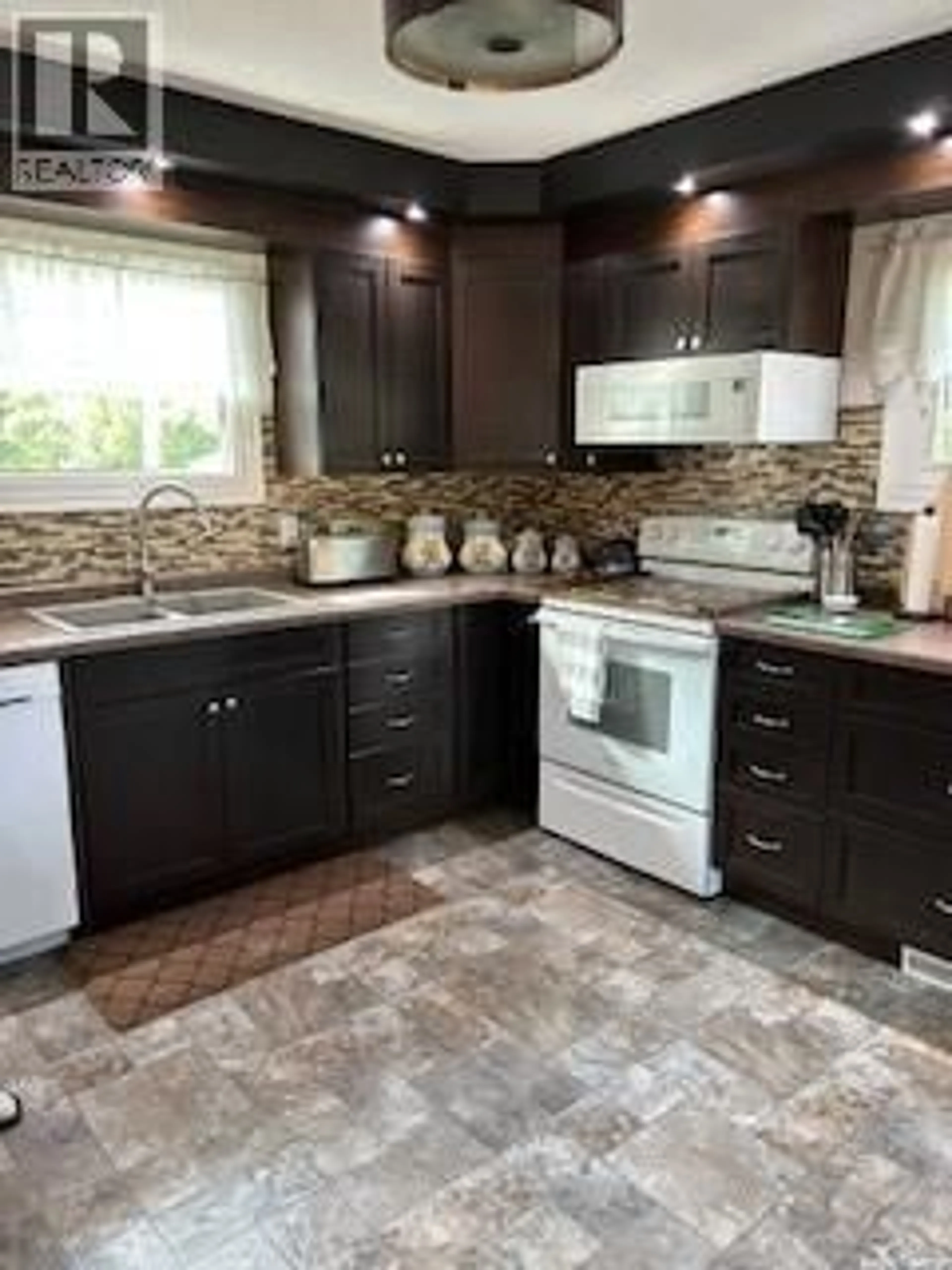 Open concept kitchen, ceramic/tile floor for 214 HIGHWAY, Archerwill Saskatchewan S0E0B0