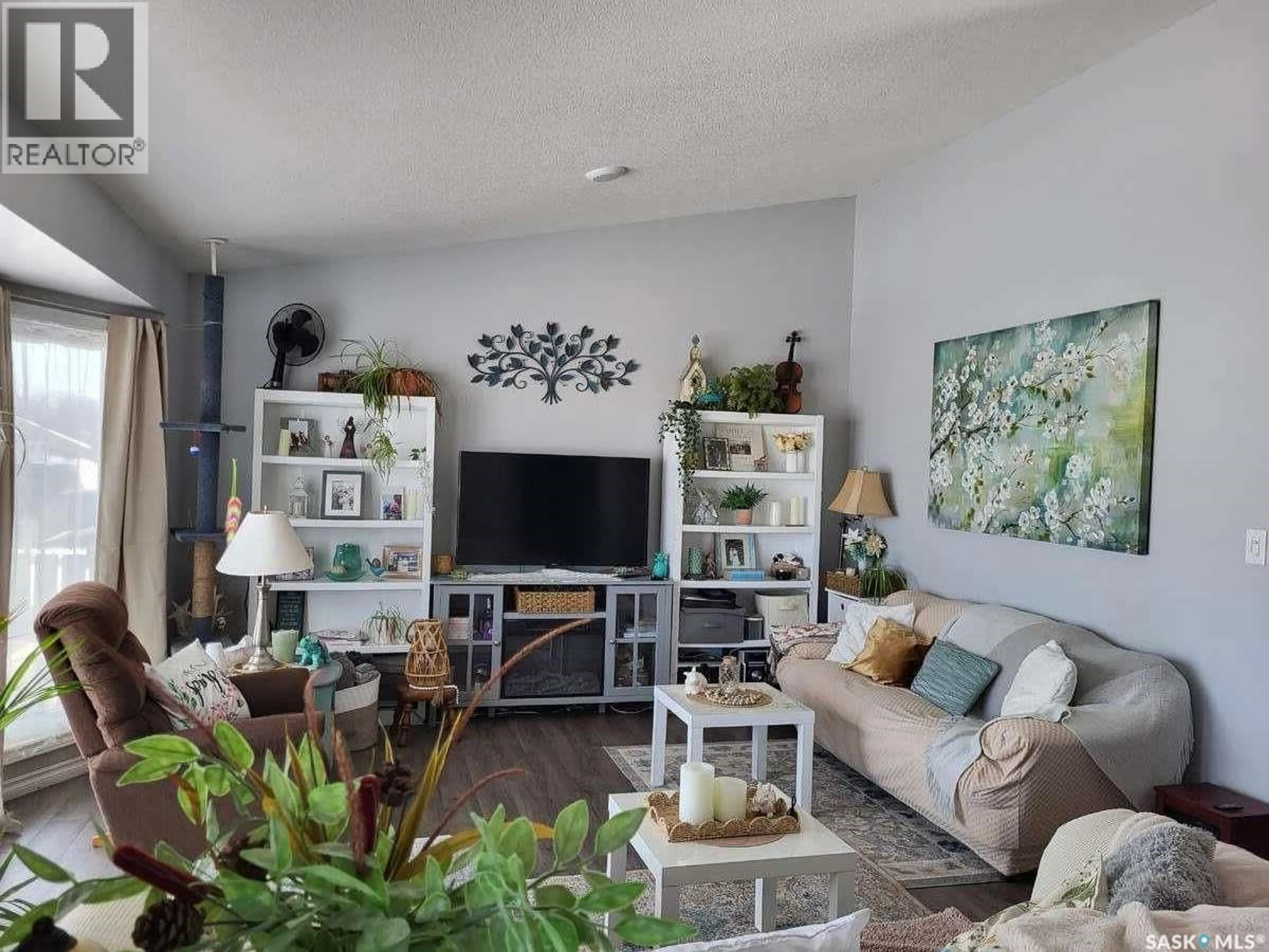 Living room with furniture, unknown for 210 DOUGLAS PLACE, Waseca Saskatchewan S0M3A0