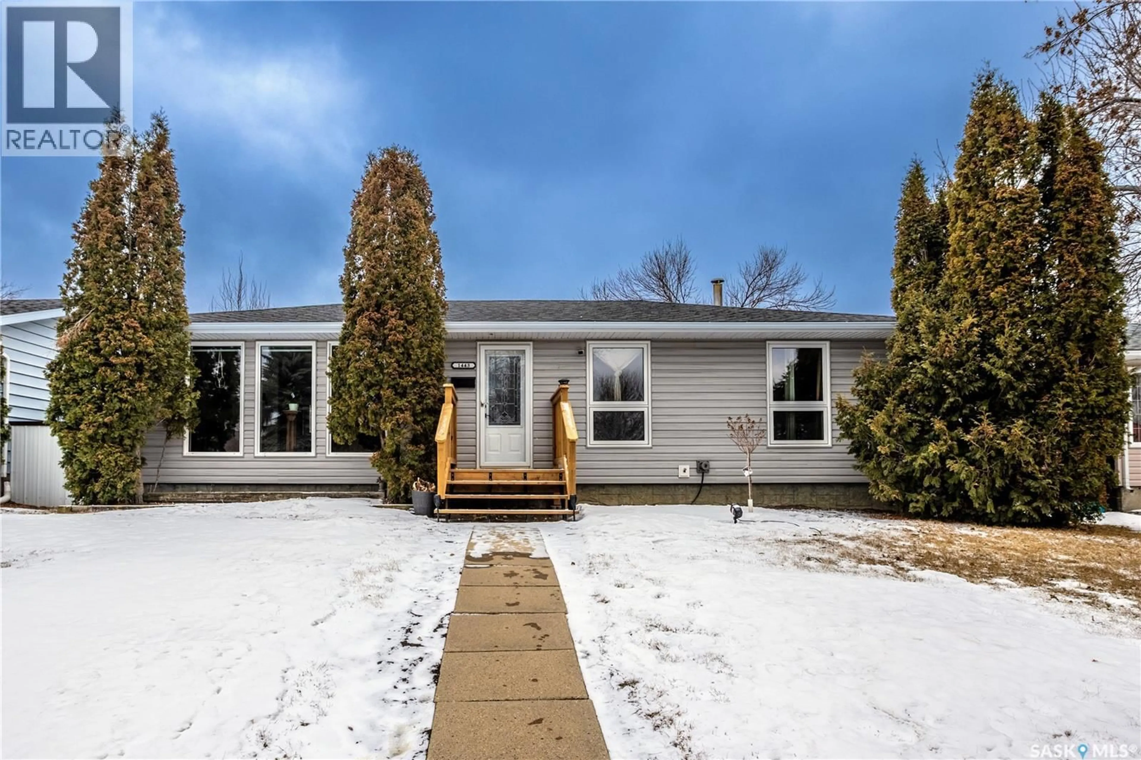 Home with vinyl exterior material, street for 1443 SMITH STREET, Moose Jaw Saskatchewan S6H6W6