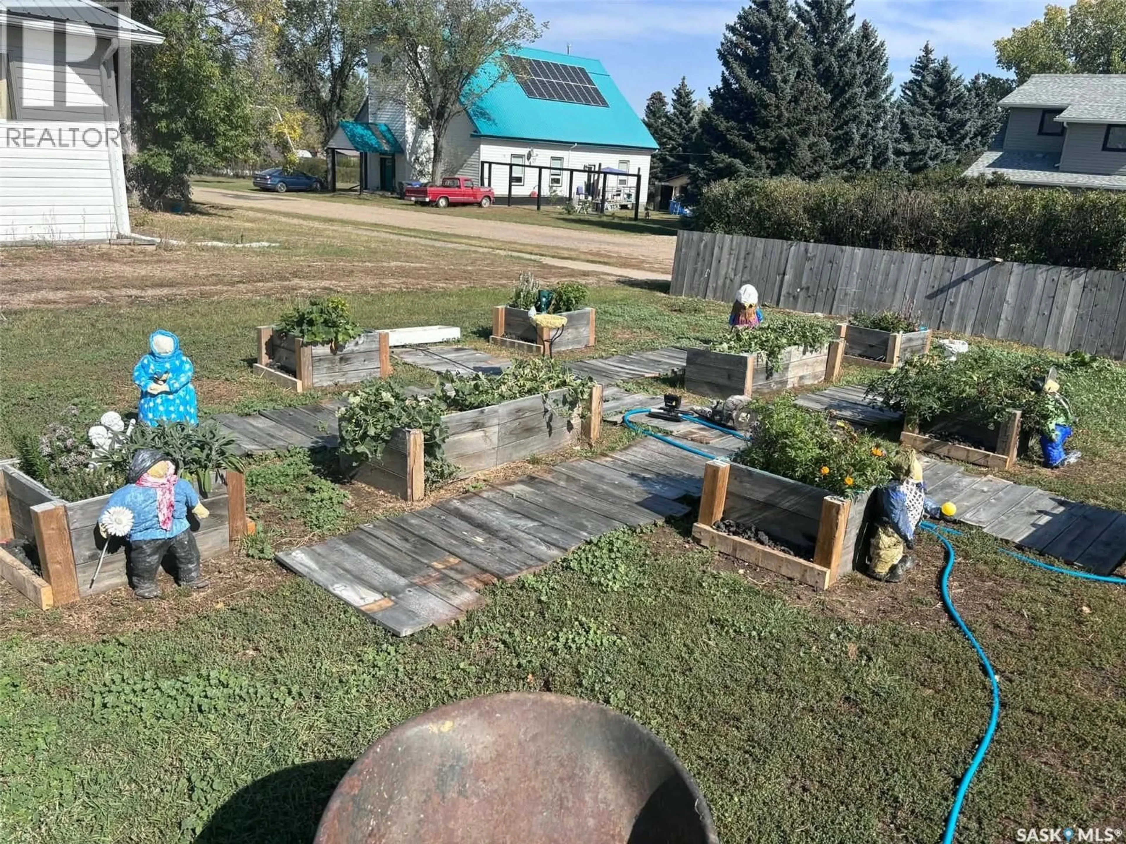 A pic from outside/outdoor area/front of a property/back of a property/a pic from drone, unknown for 58 2ND STREET, Tompkins Saskatchewan S0N2S0