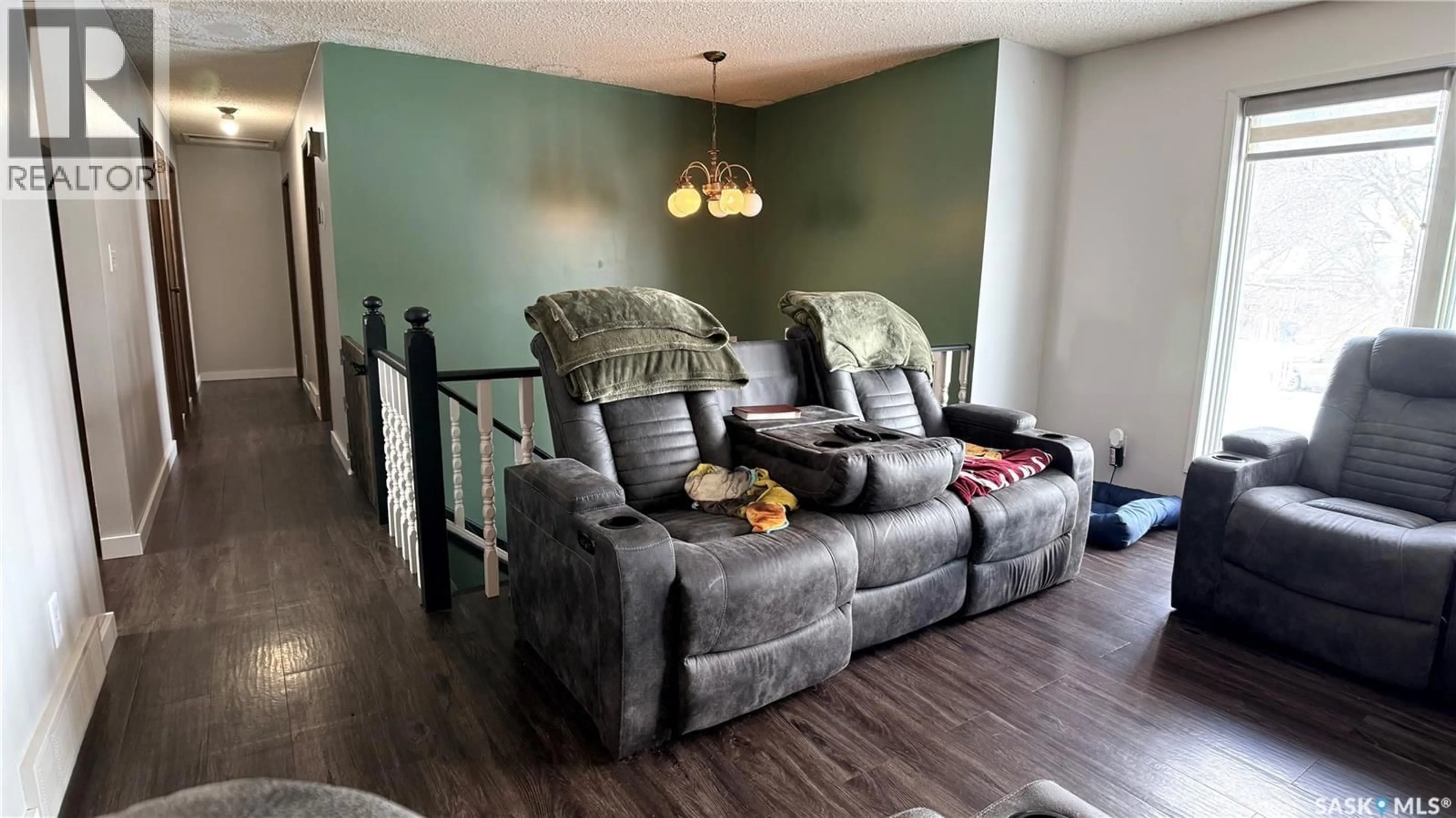 Living room with furniture, unknown for 422 SPRUCE DRIVE, Estevan Saskatchewan S4A2A8