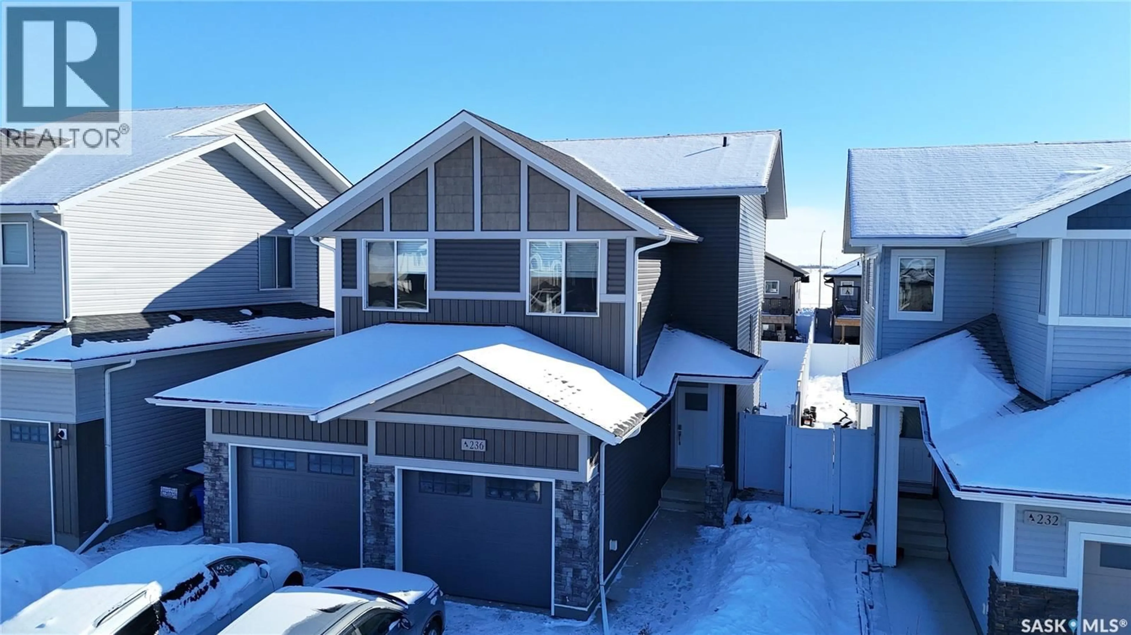 A pic from outside/outdoor area/front of a property/back of a property/a pic from drone, street for 236 BARRETT STREET, Saskatoon Saskatchewan S7L1C1