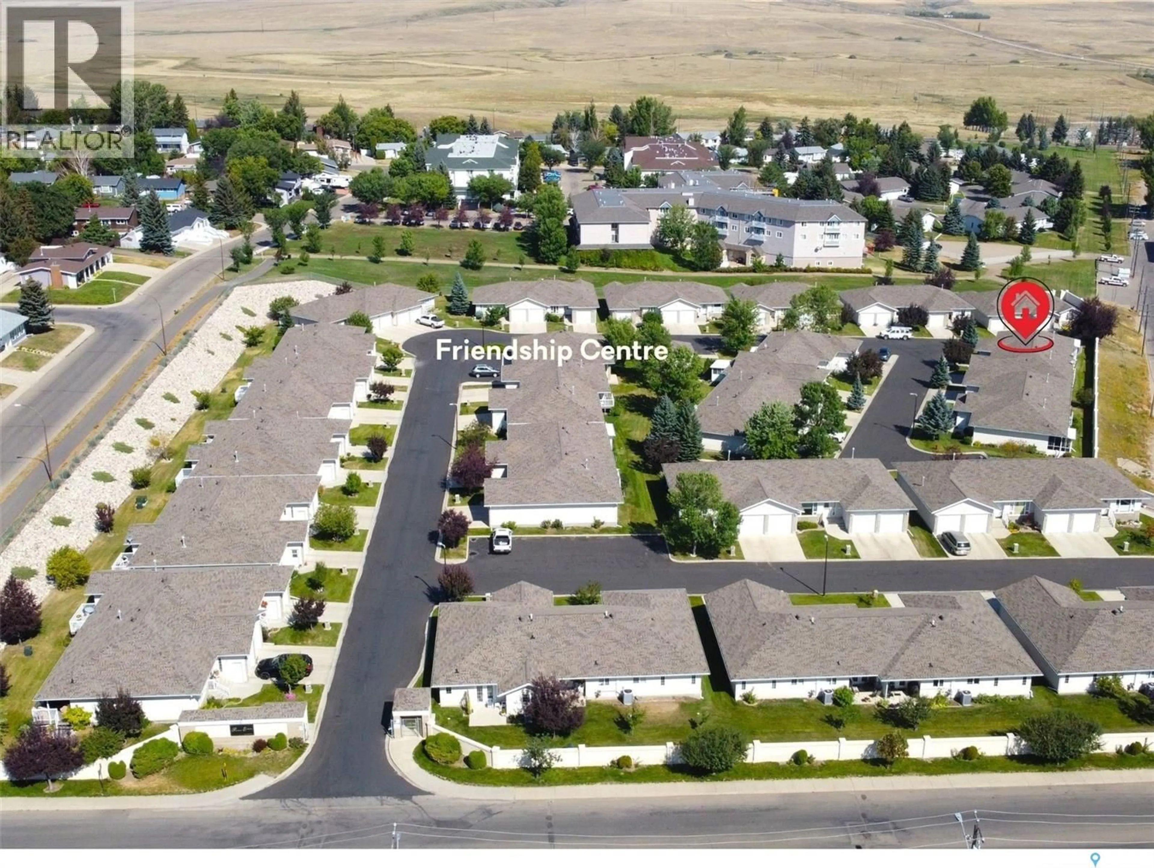 A pic from outside/outdoor area/front of a property/back of a property/a pic from drone, street for W - 417 165 ROBERT STREET, Swift Current Saskatchewan S9H5E7