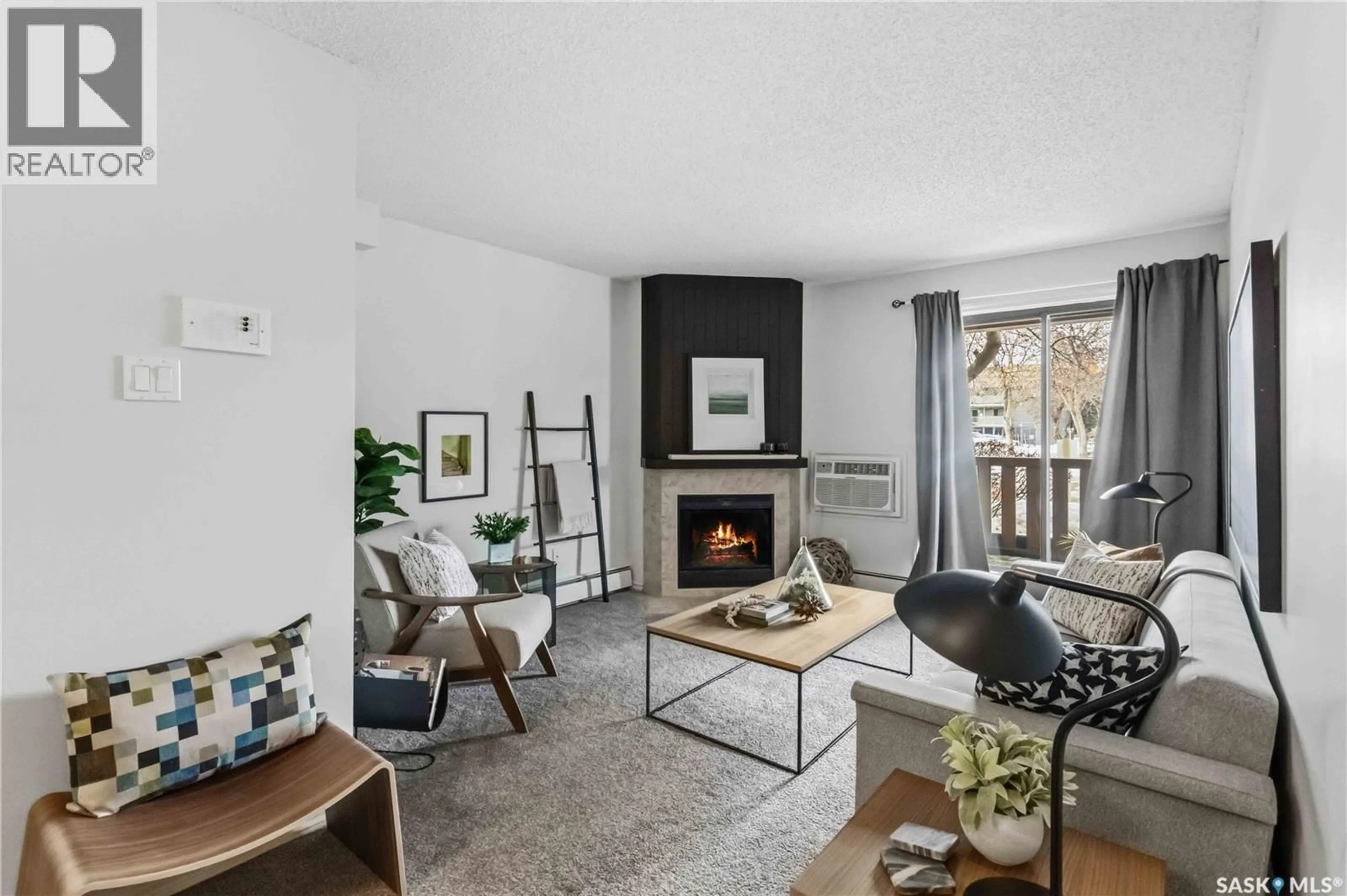 Living room with furniture, unknown for D2 - 1121 MCKERCHER DRIVE, Saskatoon Saskatchewan S7H5B8