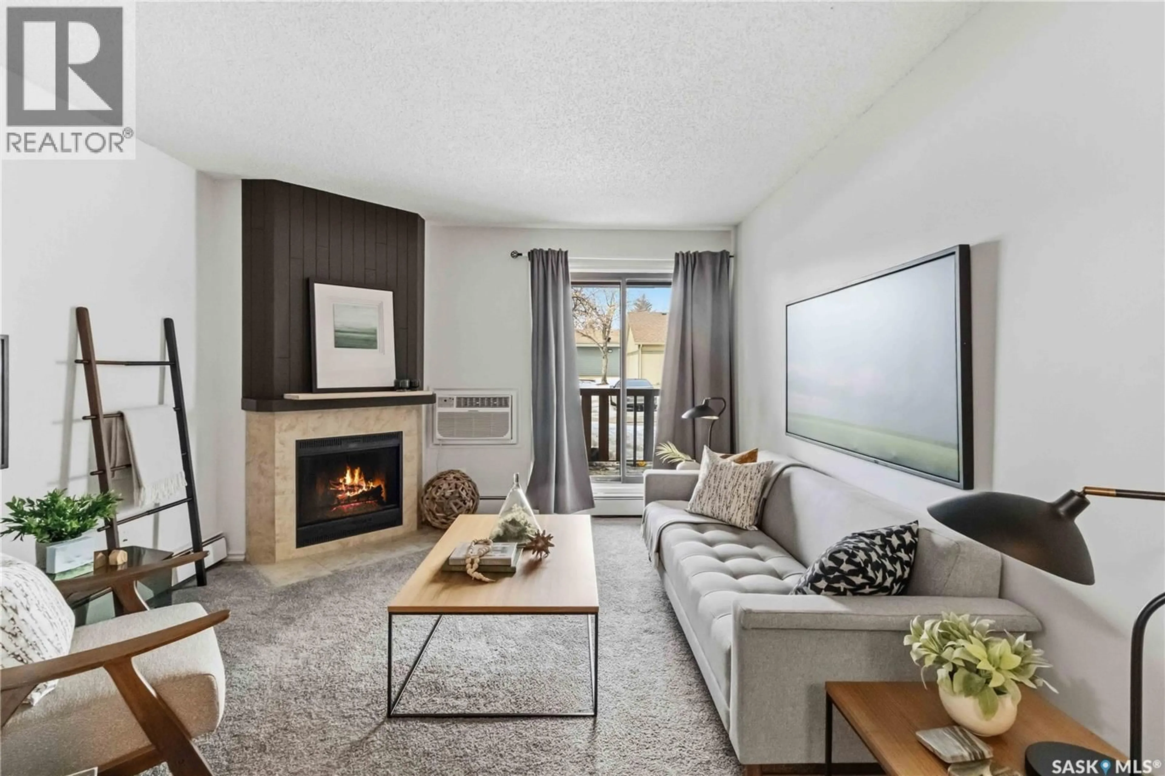 Living room with furniture, unknown for D2 - 1121 MCKERCHER DRIVE, Saskatoon Saskatchewan S7H5B8